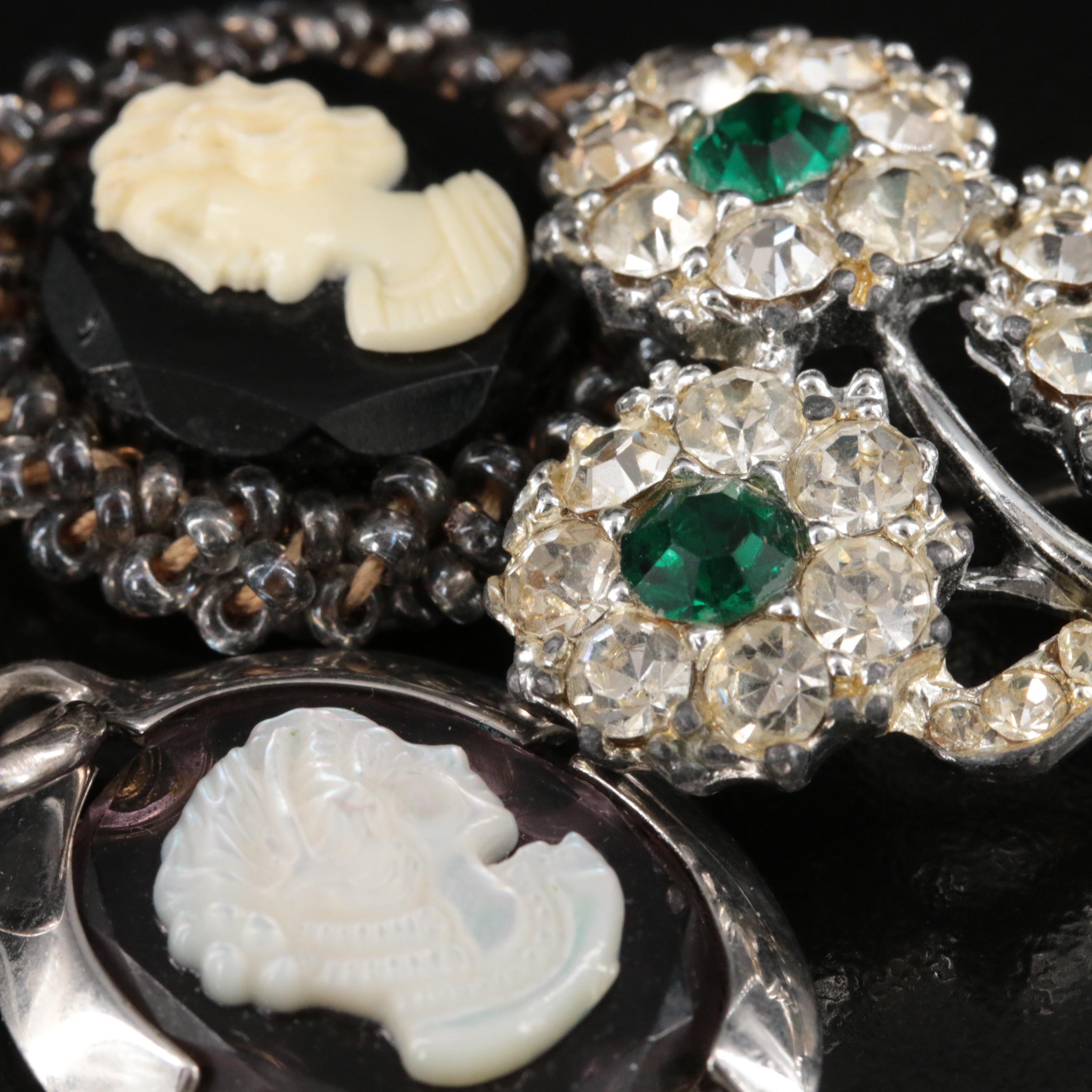 Mother-of-Pearl and Rhinestone Cameo Pendants and Flower Brooch