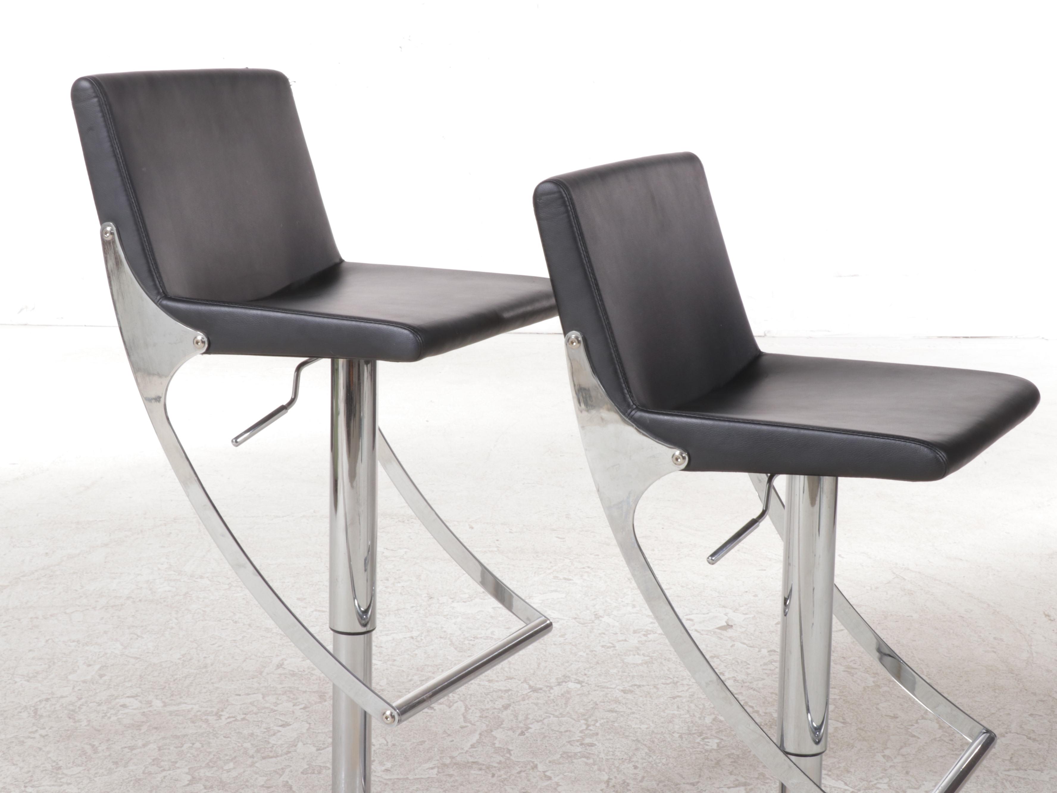 Pair of Nuevo "Swing" Chromed Steel and Naugahyde Adjustable-Height Bar Stools