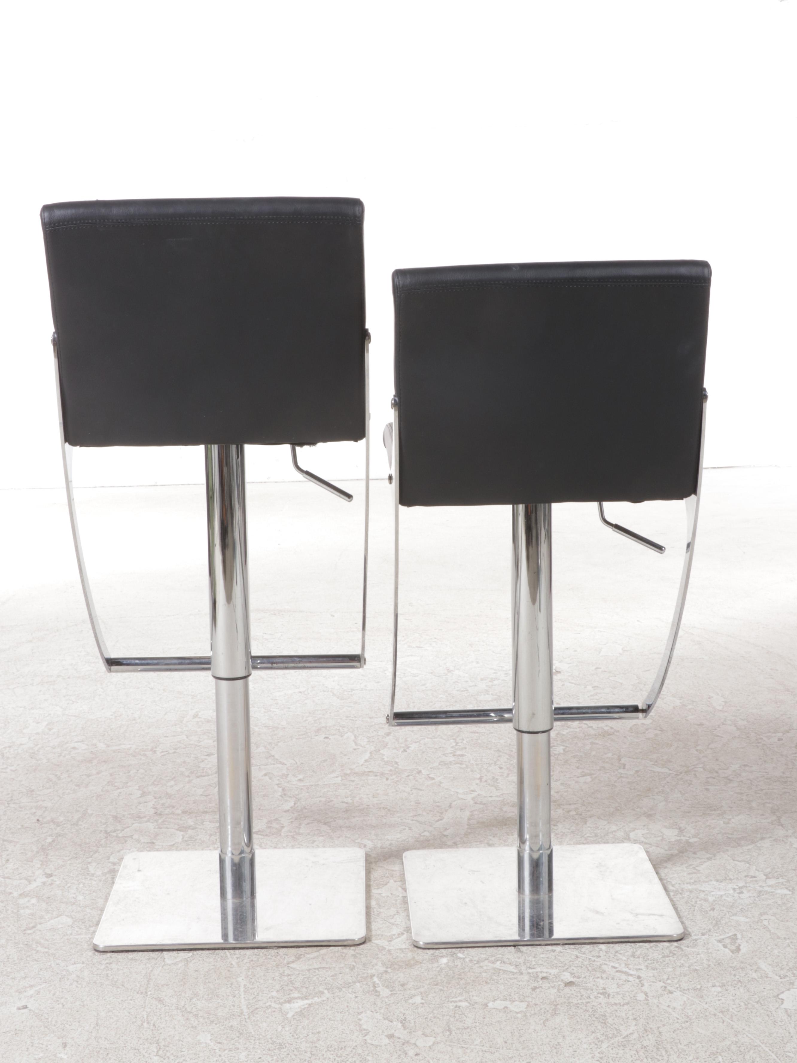 Pair of Nuevo "Swing" Chromed Steel and Naugahyde Adjustable-Height Bar Stools
