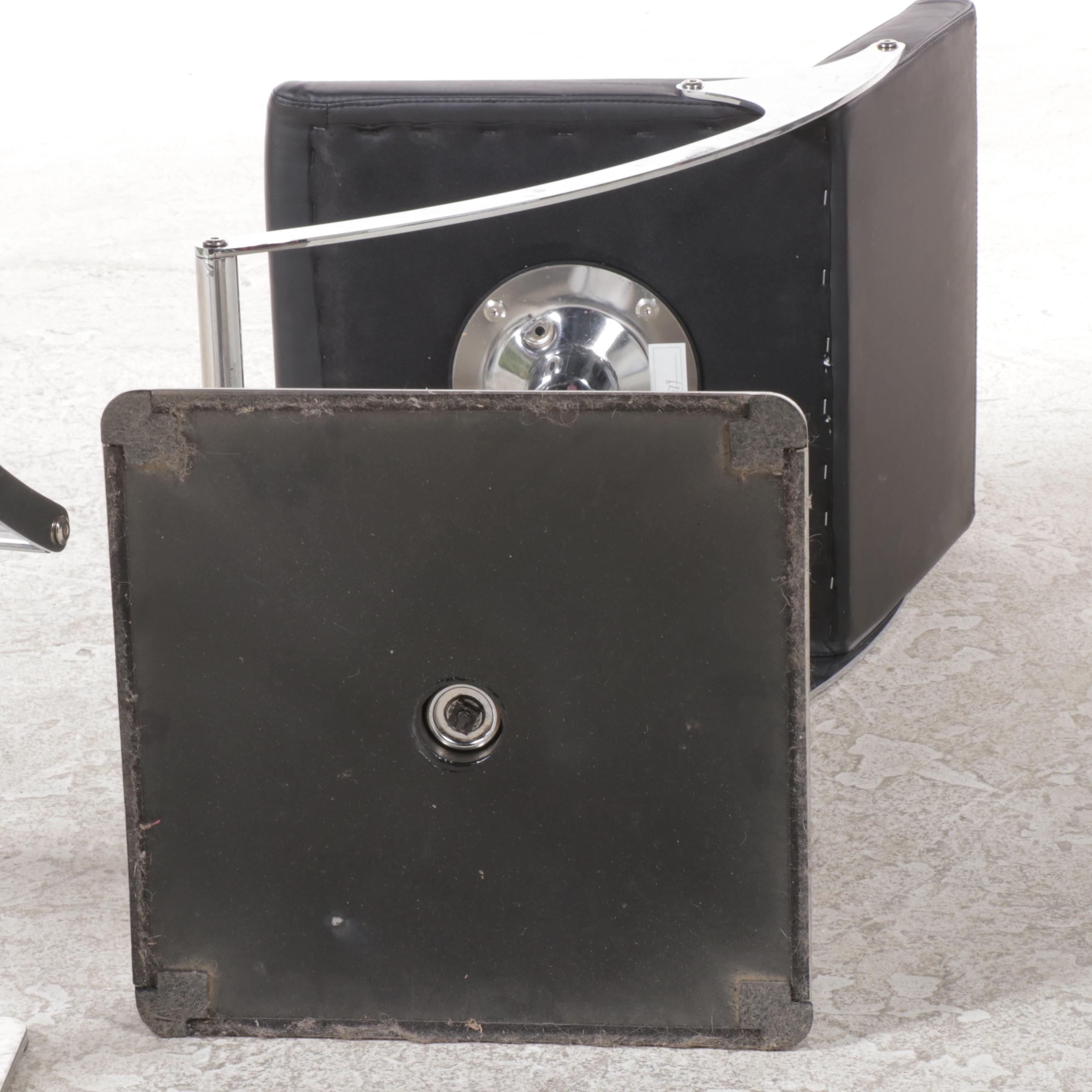 Pair of Nuevo "Swing" Chromed Steel and Naugahyde Adjustable-Height Bar Stools