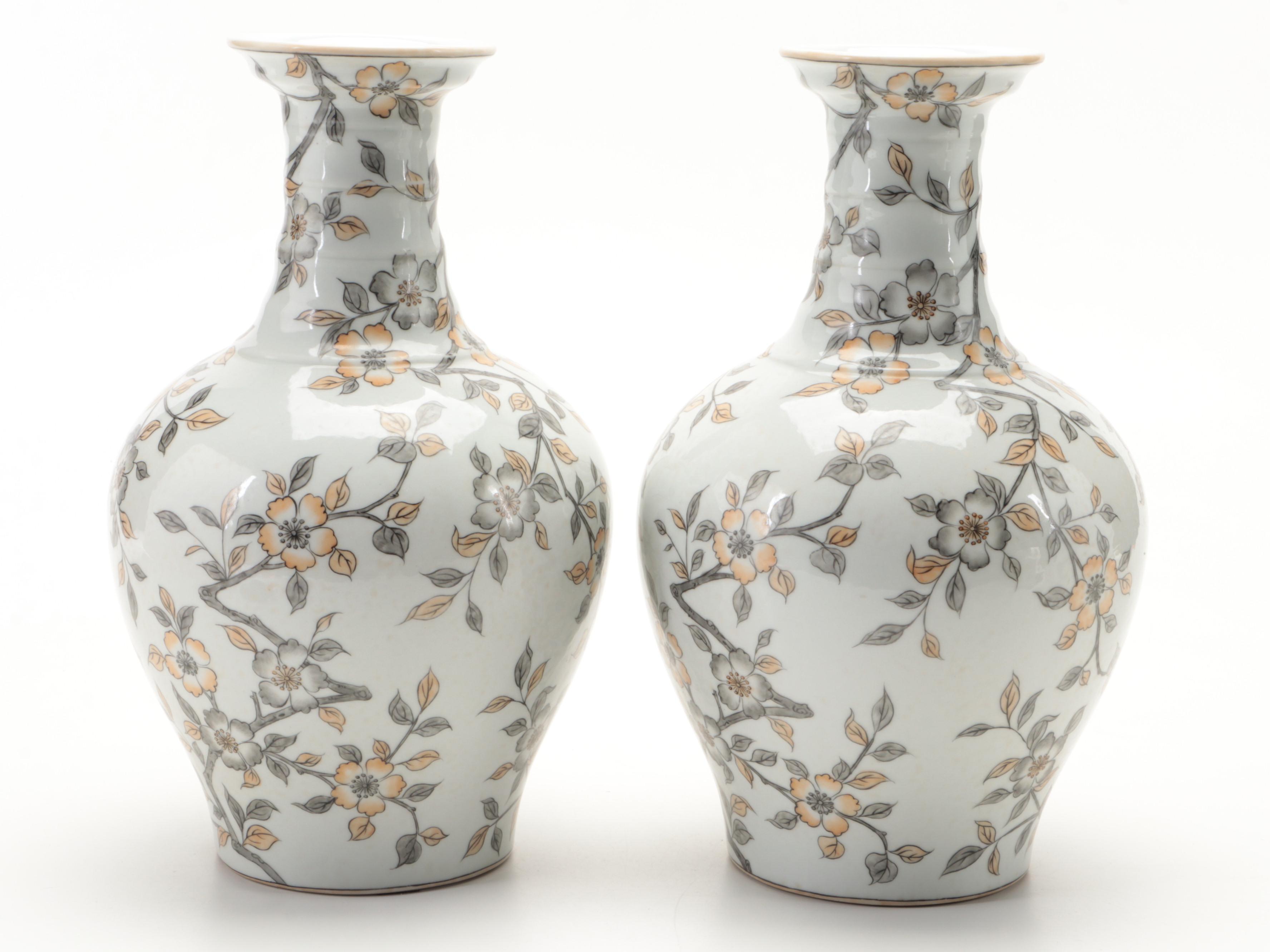 Pair of Porcelain Plum Blossom Vases and Gourd Lidded Tea Jar