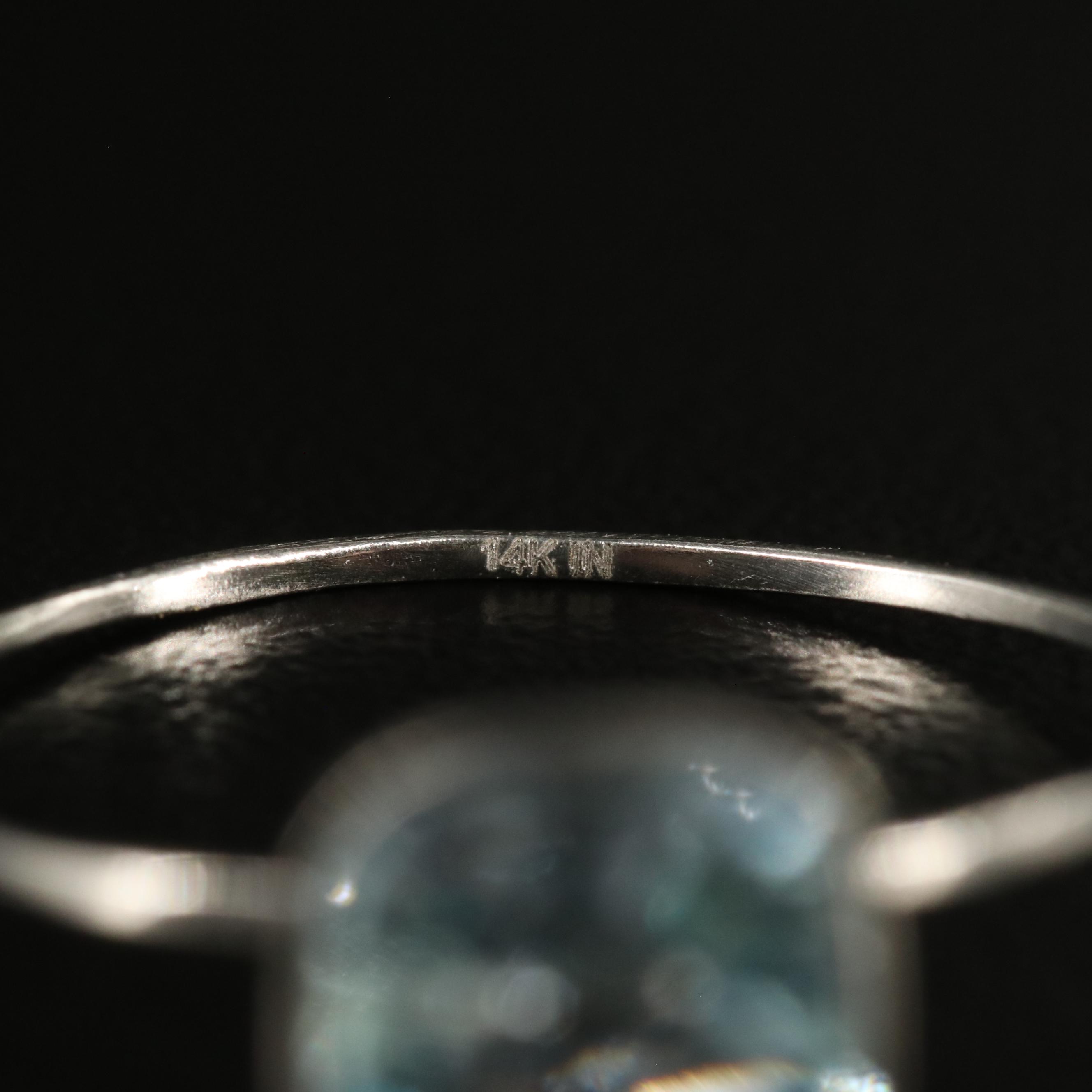 14K Blue Topaz Solitaire Ring