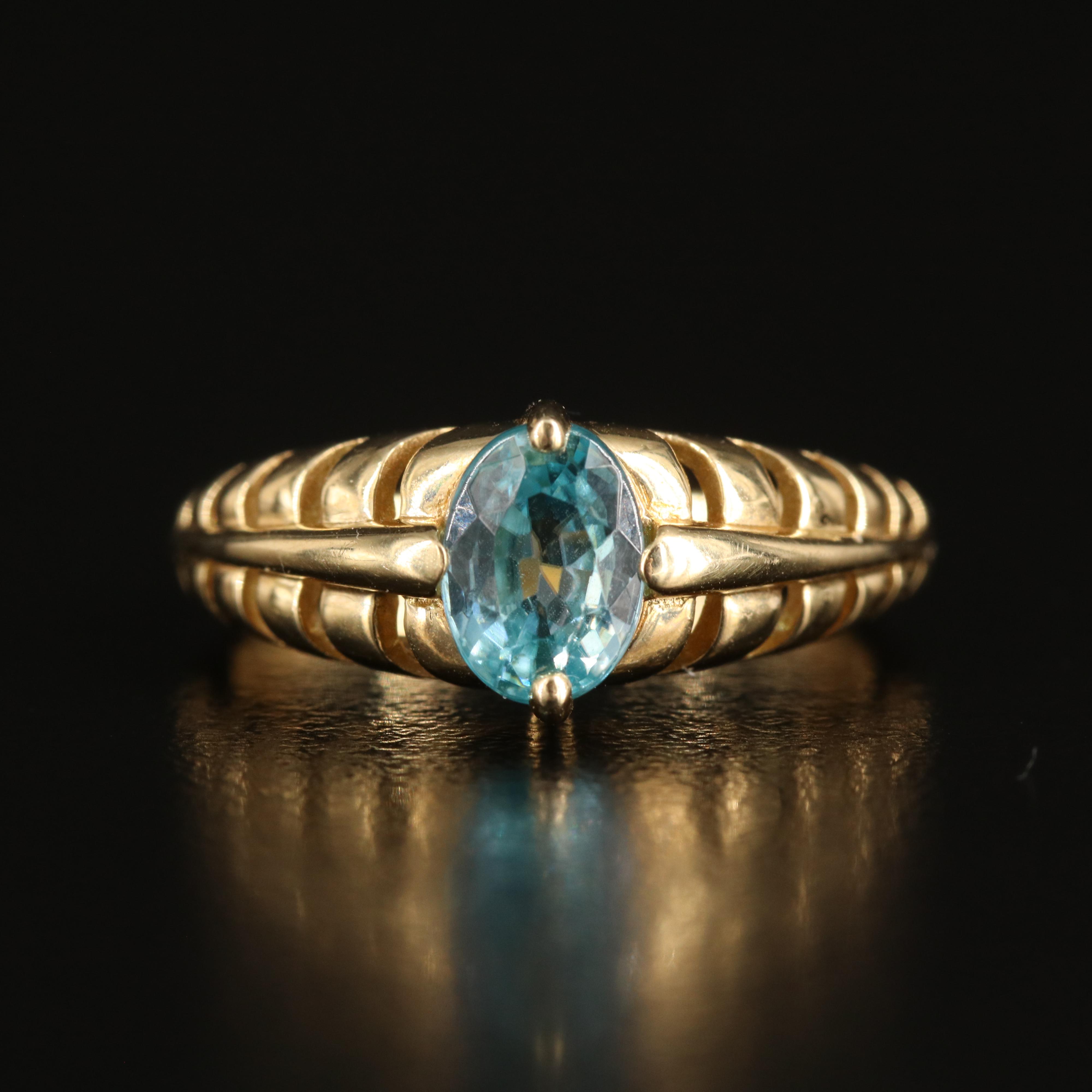 14K Sky Blue Topaz Ring