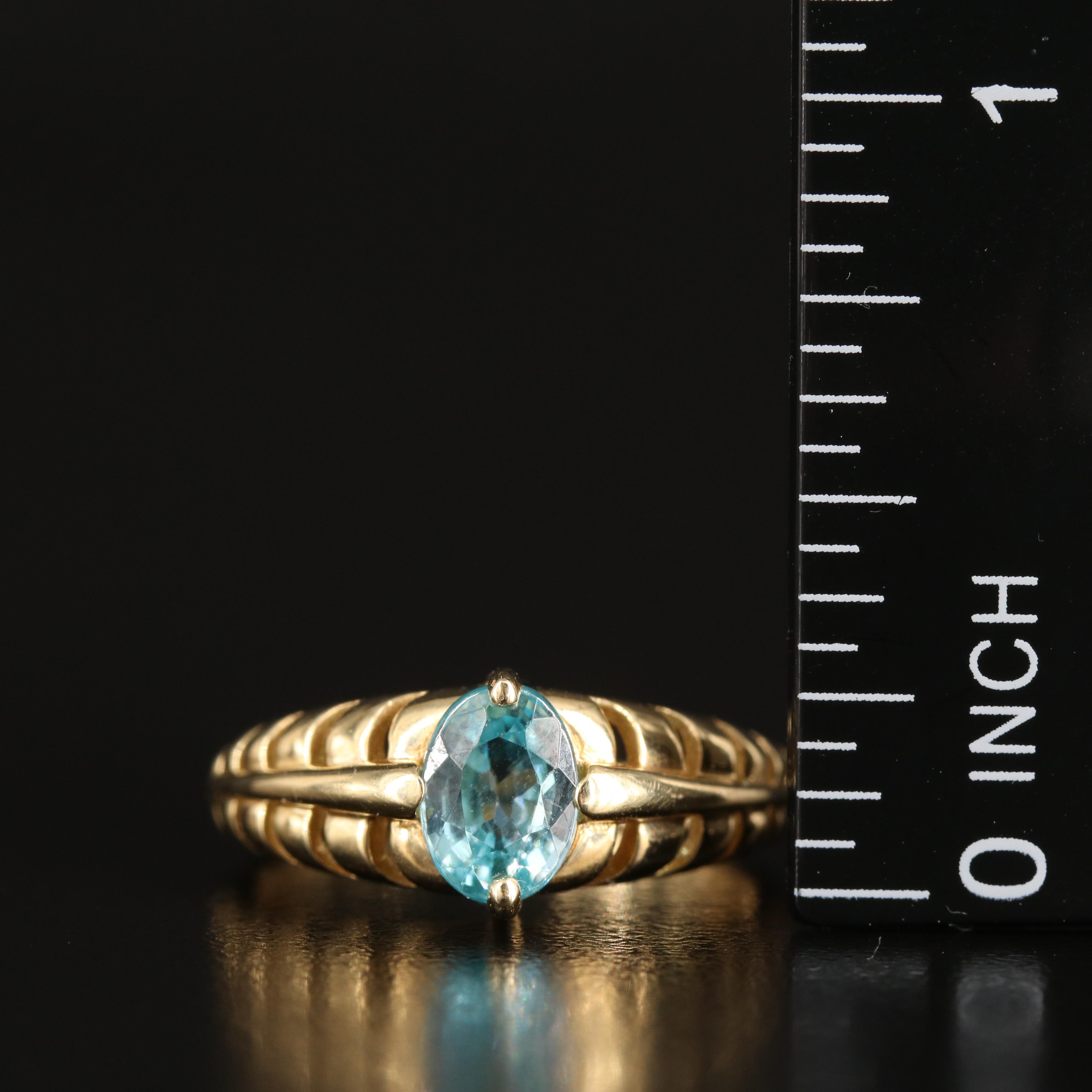14K Sky Blue Topaz Ring