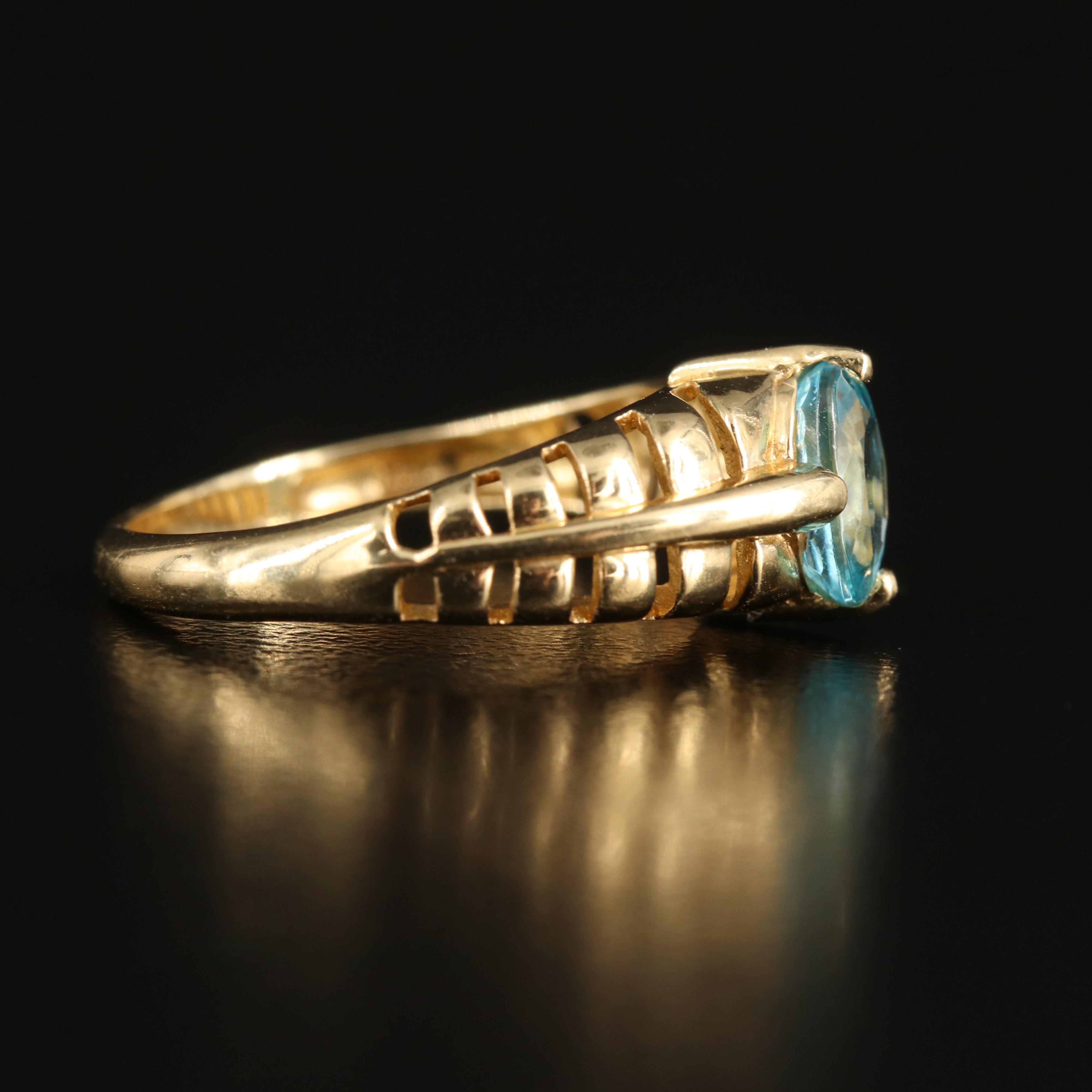 14K Sky Blue Topaz Ring