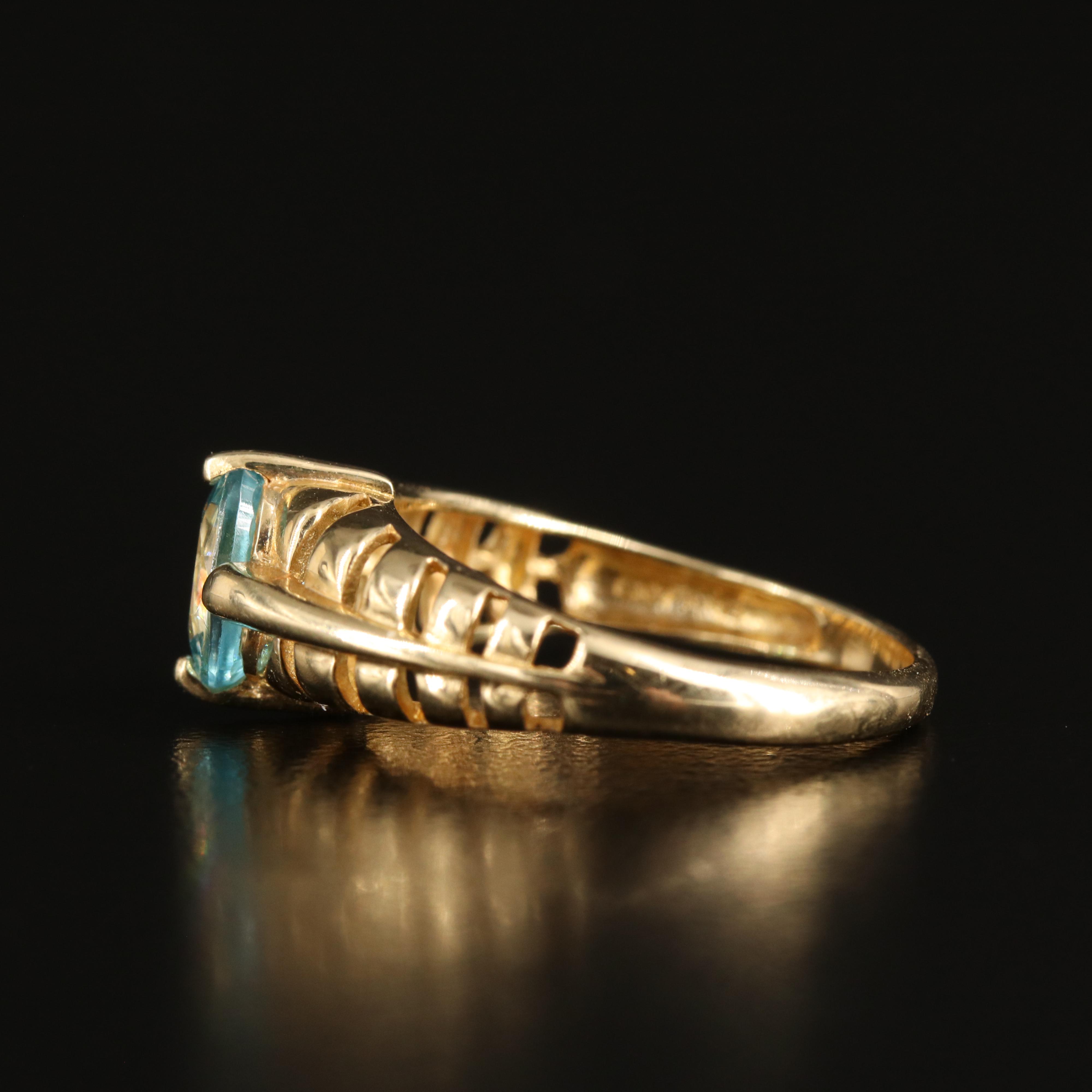 14K Sky Blue Topaz Ring