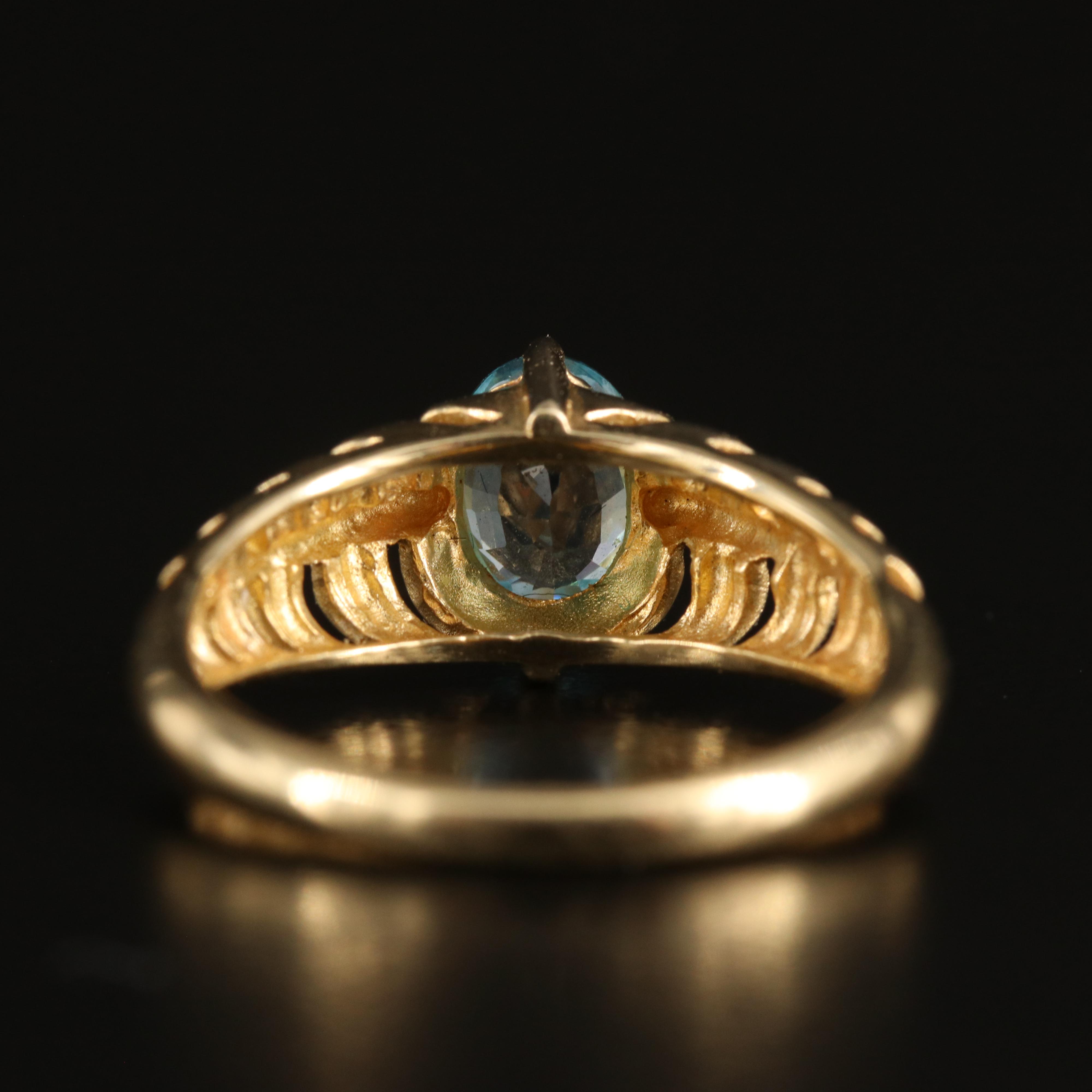 14K Sky Blue Topaz Ring