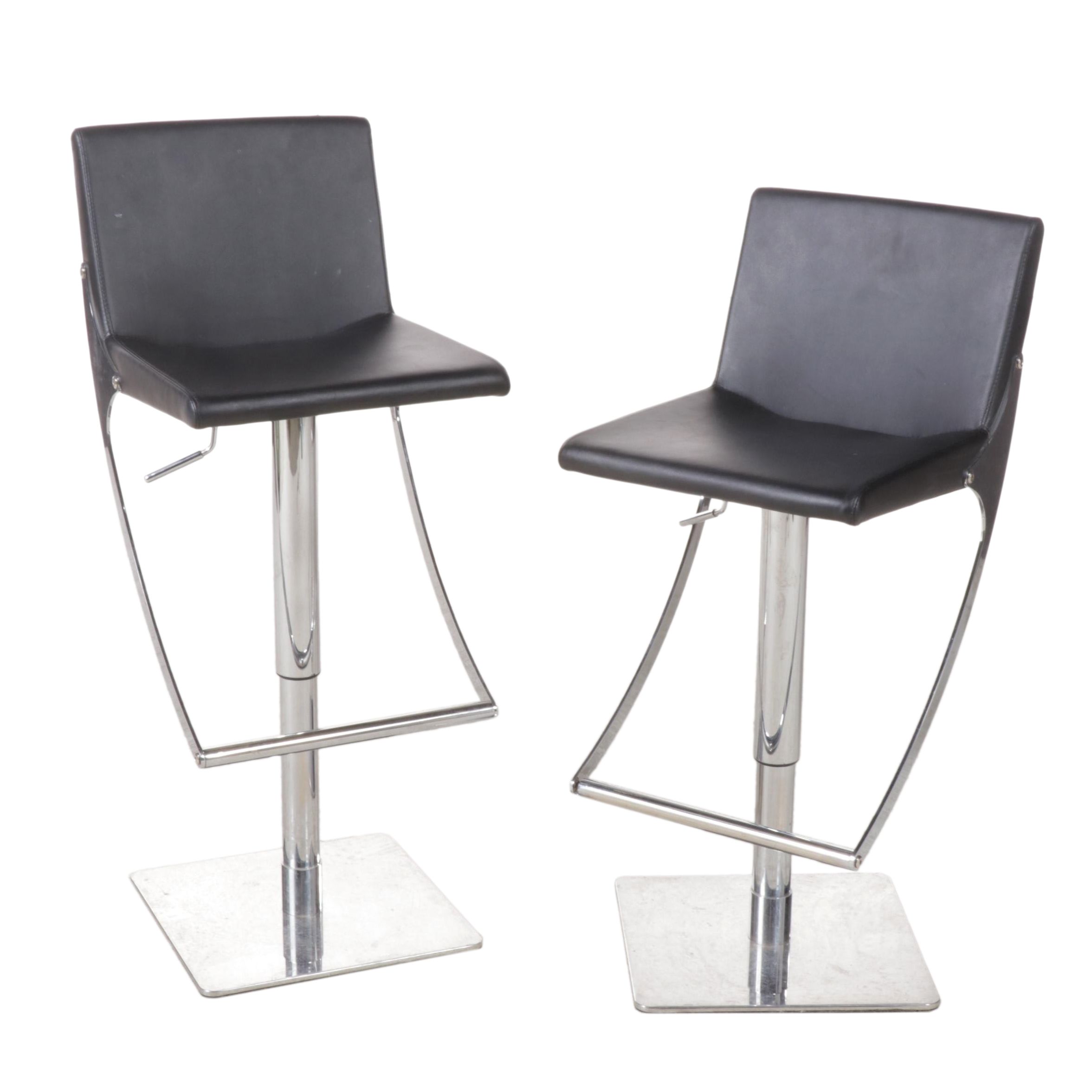 Pair of Nuevo "Swing" Chromed Steel and Naugahyde Adjustable-Height Bar Stools
