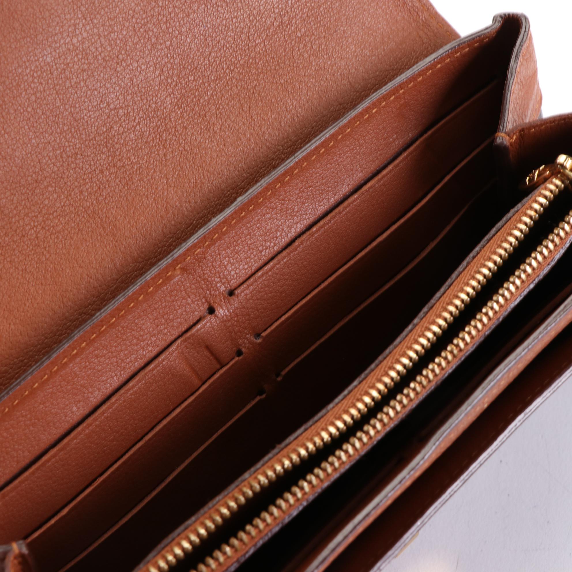 Louis Vuitton Elysee Wallet in Monogram Canvas and Leather