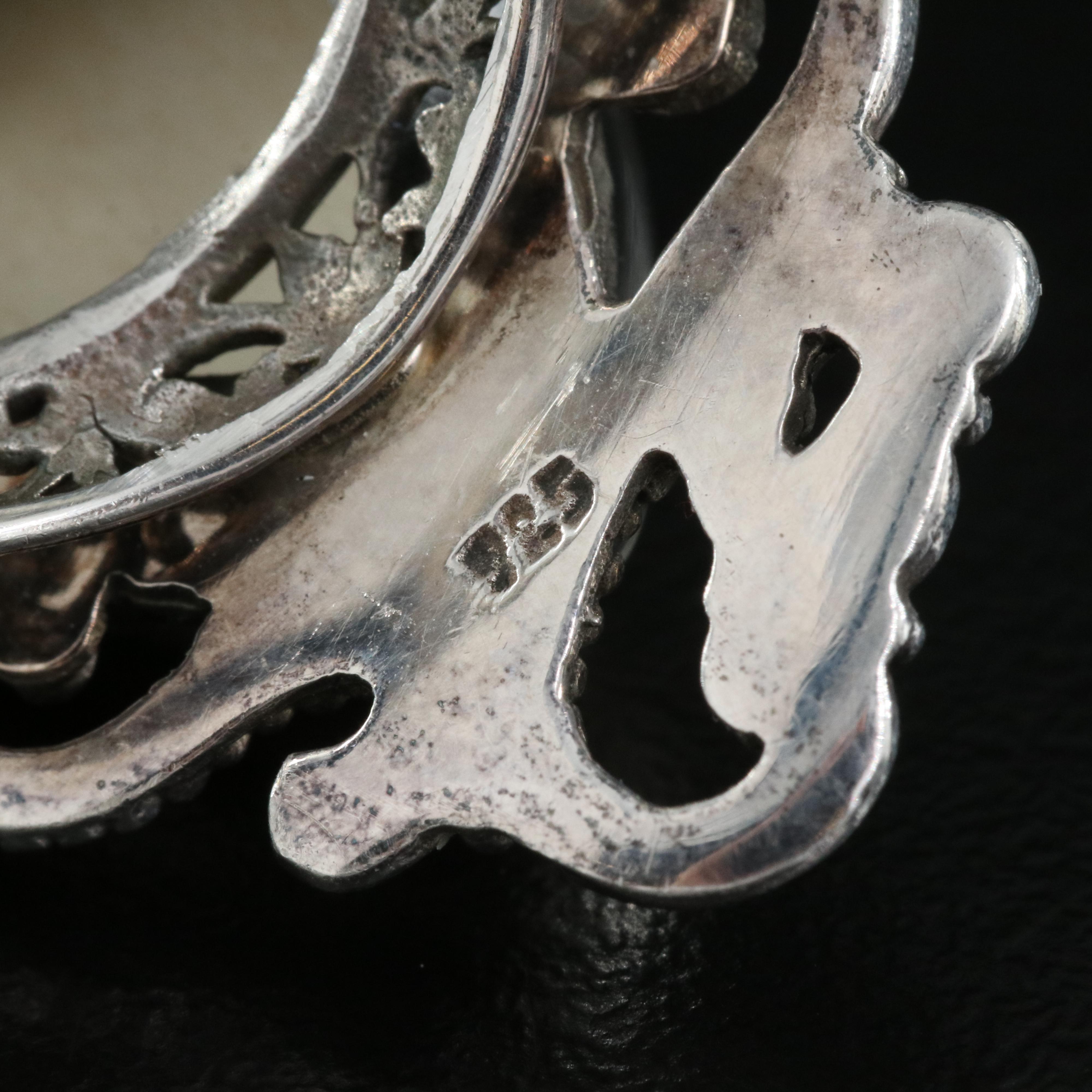 Sterling Figural Ring Including Bone, Iolite and Peridot