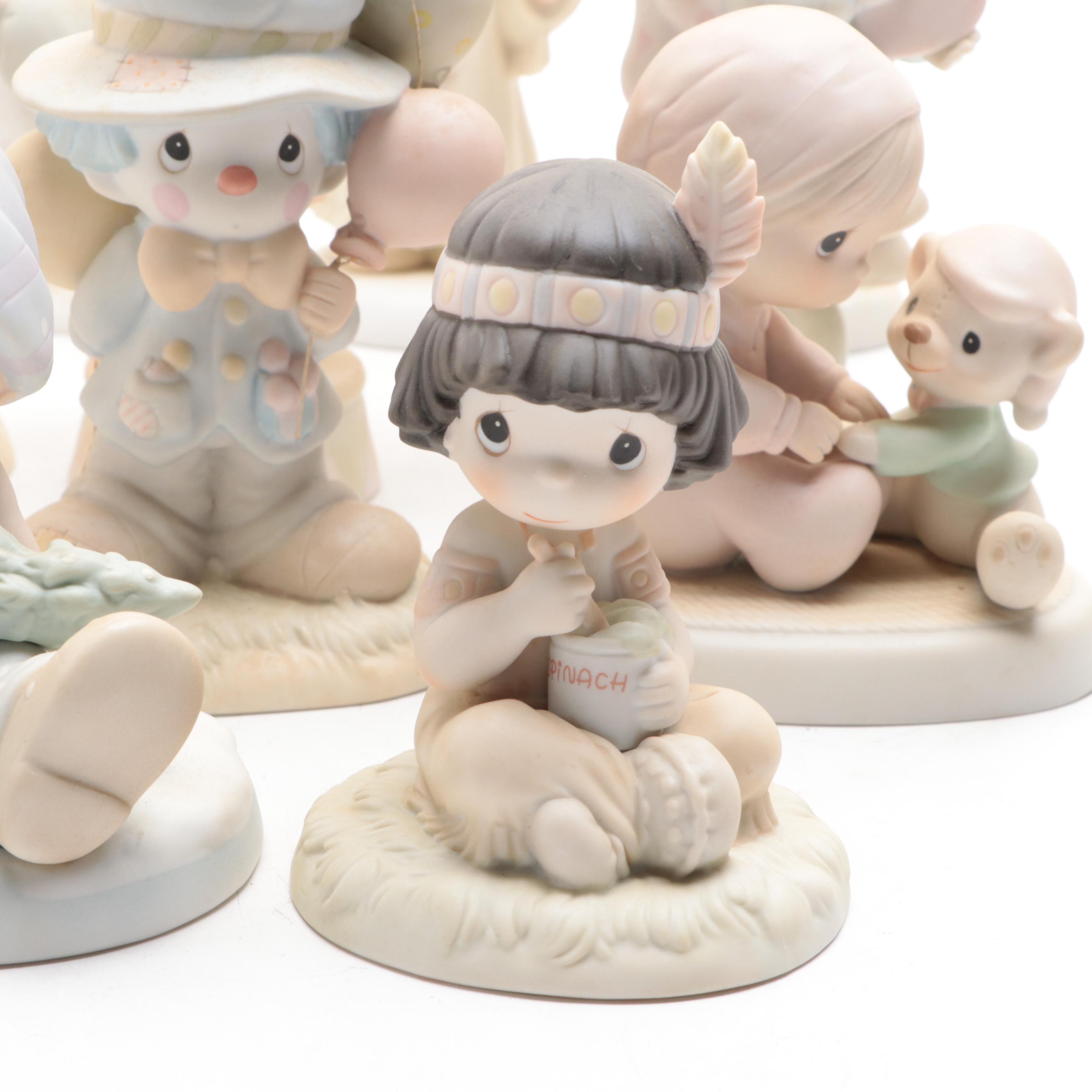 Precious Moments Porcelain Figurines Including "Put on a Happy Face" and More