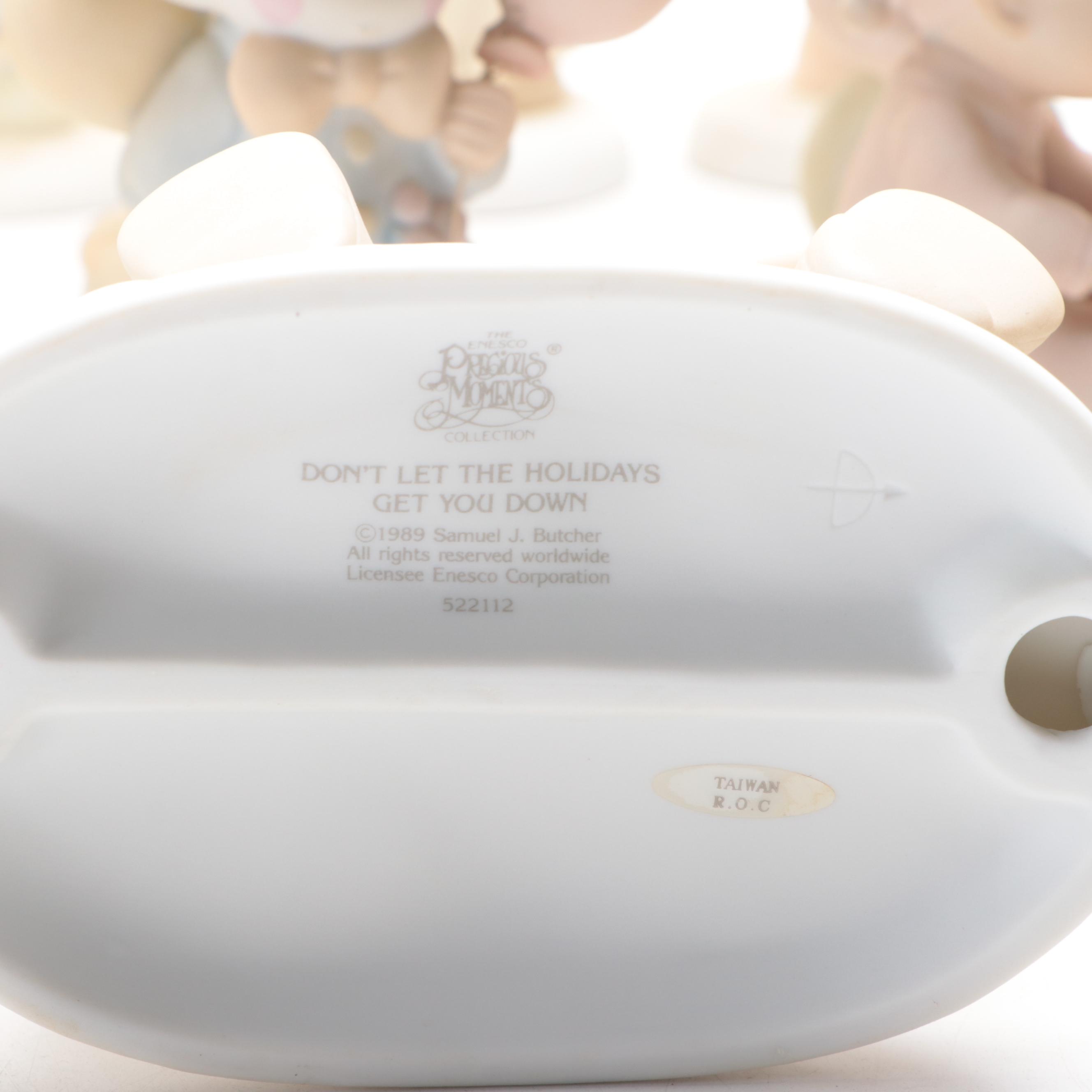 Precious Moments Porcelain Figurines Including "Put on a Happy Face" and More