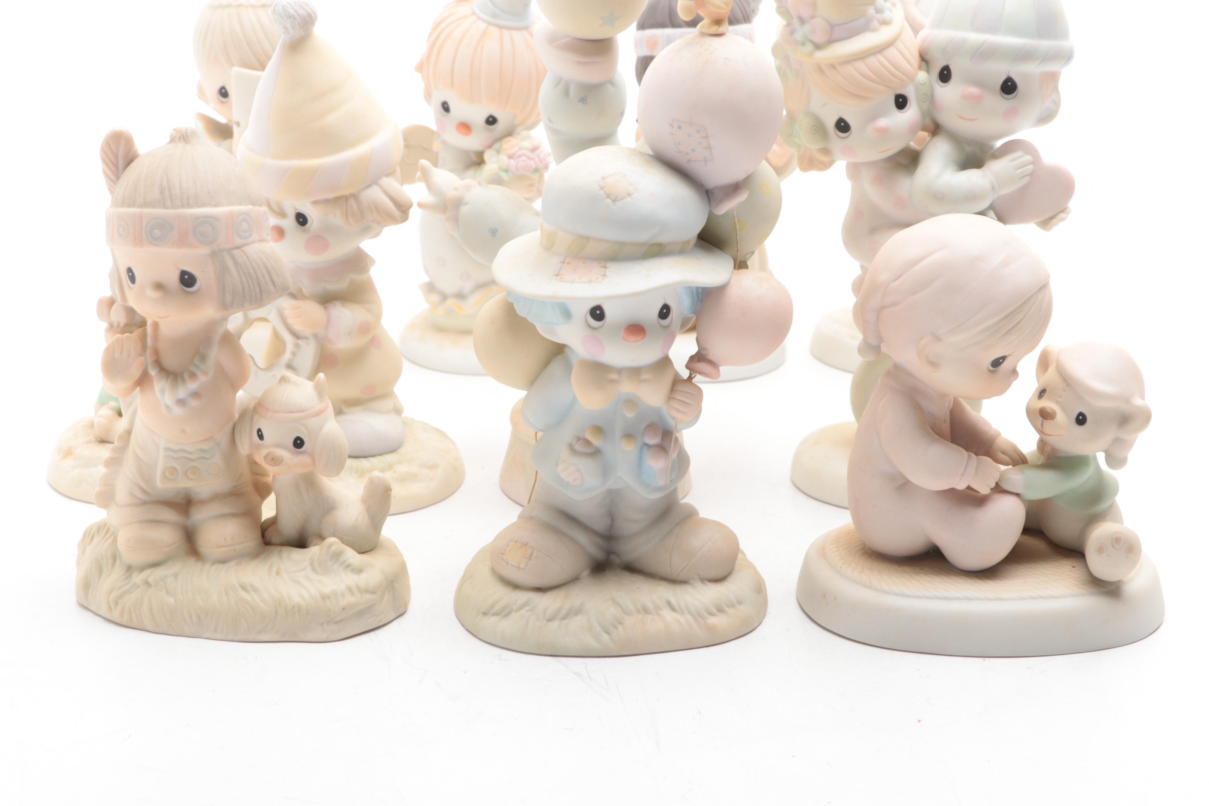 Precious Moments Porcelain Figurines Including "Put on a Happy Face" and More