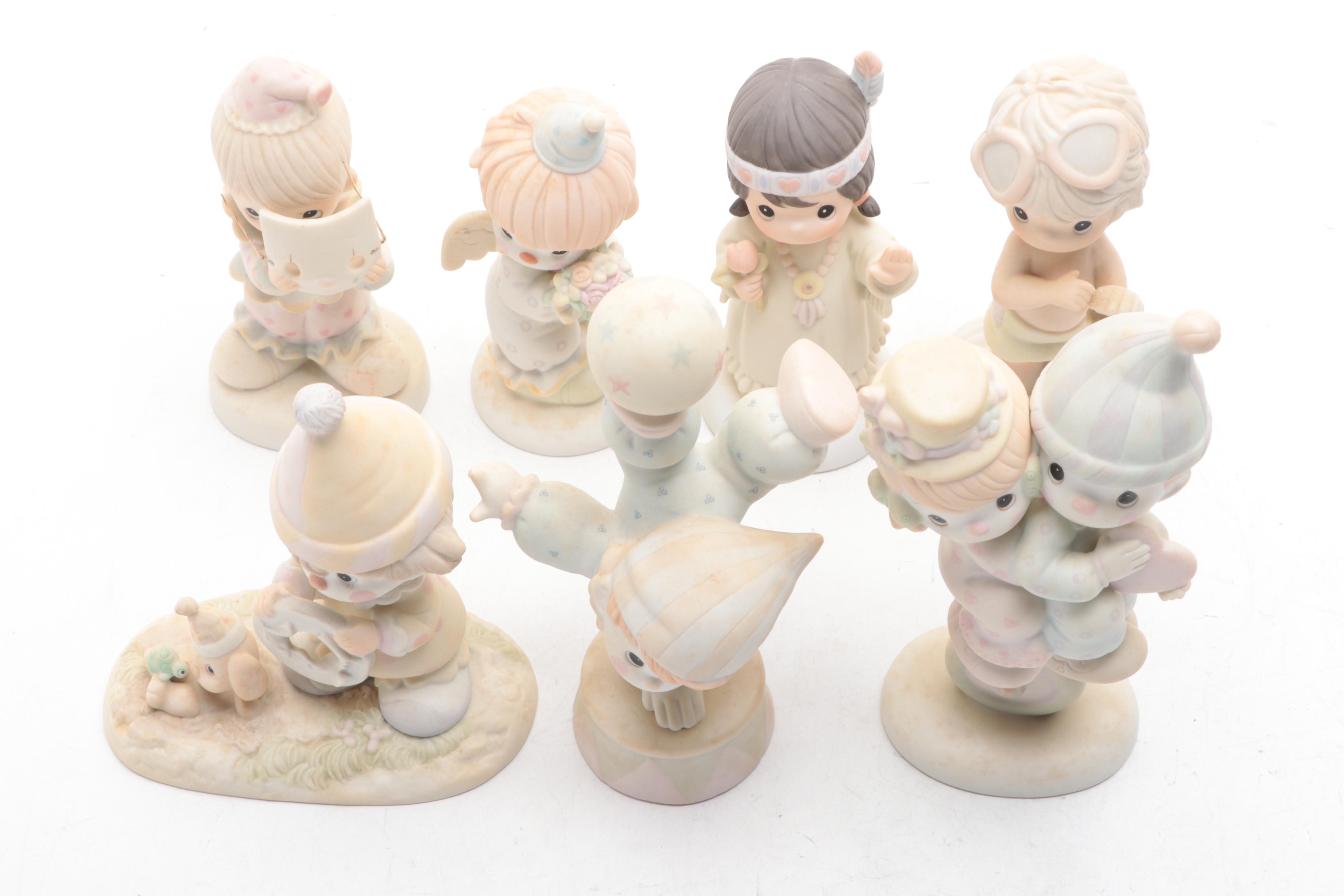 Precious Moments Porcelain Figurines Including "Put on a Happy Face" and More