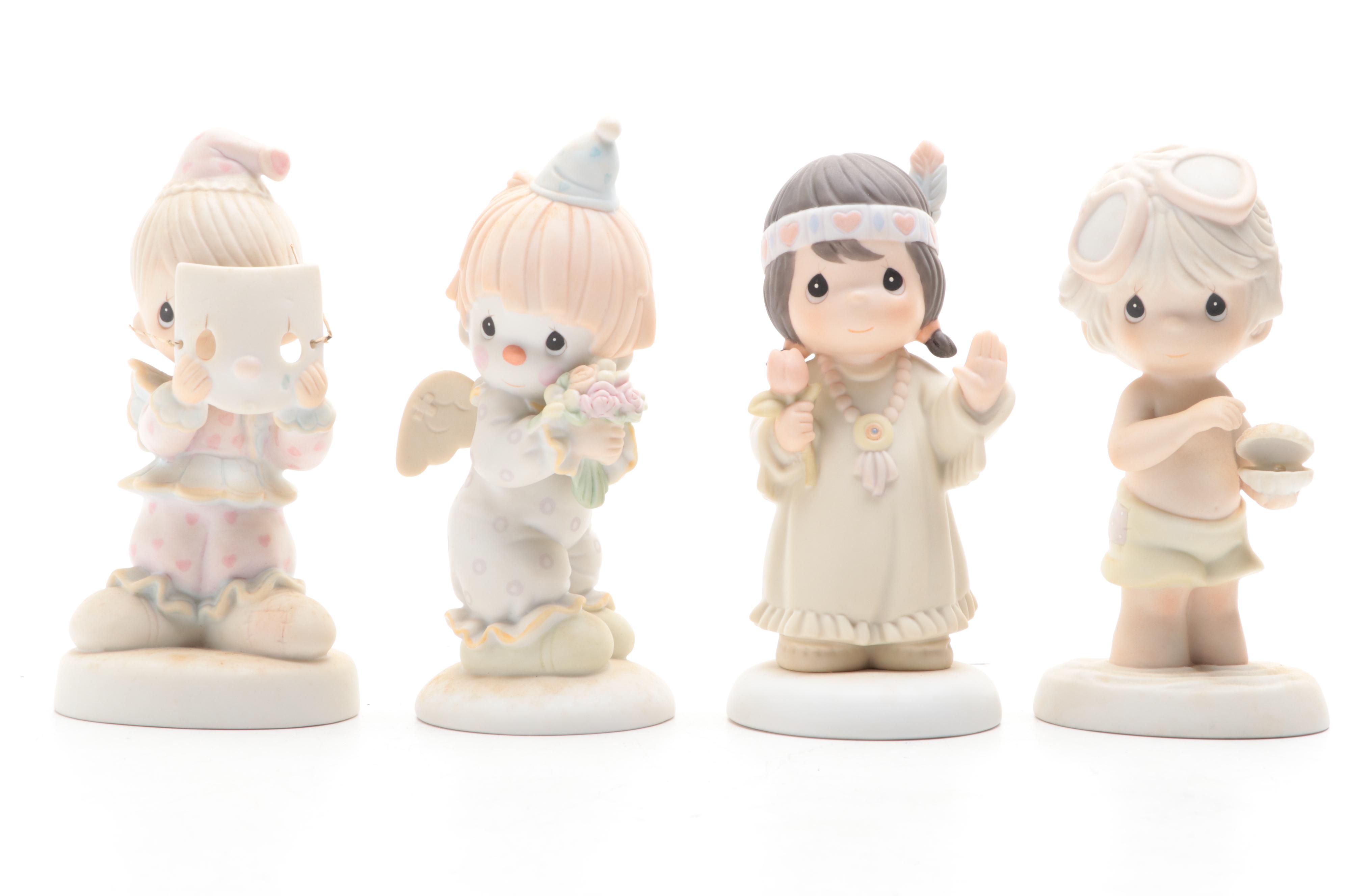 Precious Moments Porcelain Figurines Including "Put on a Happy Face" and More