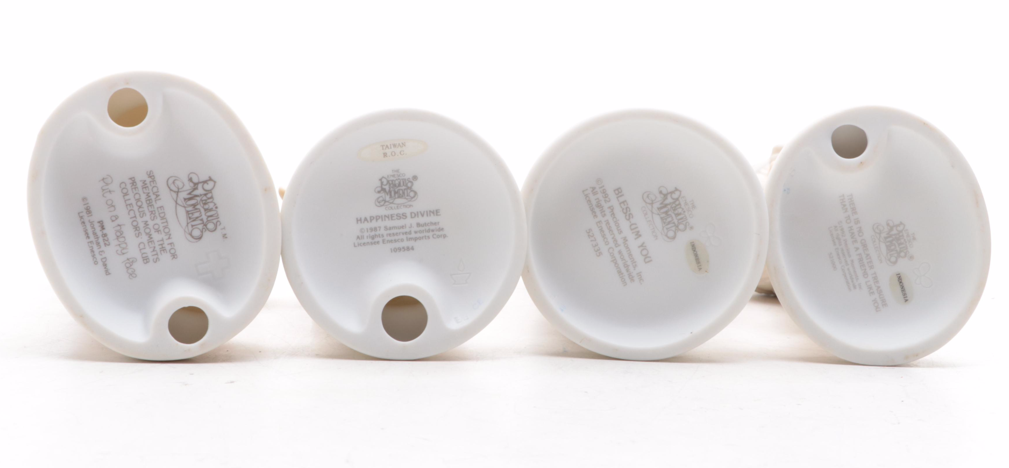 Precious Moments Porcelain Figurines Including "Put on a Happy Face" and More