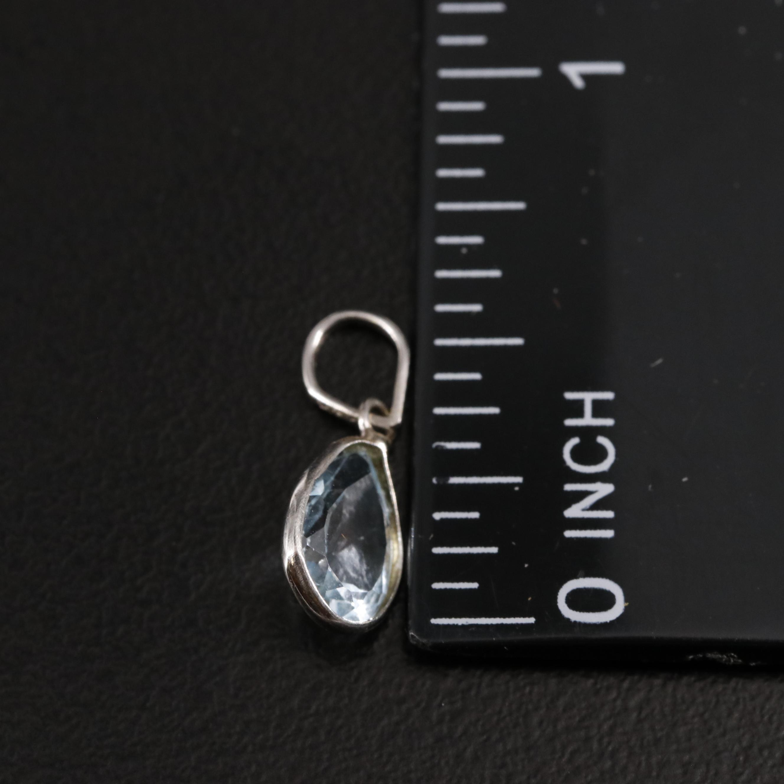 14K Blue Topaz Pendant