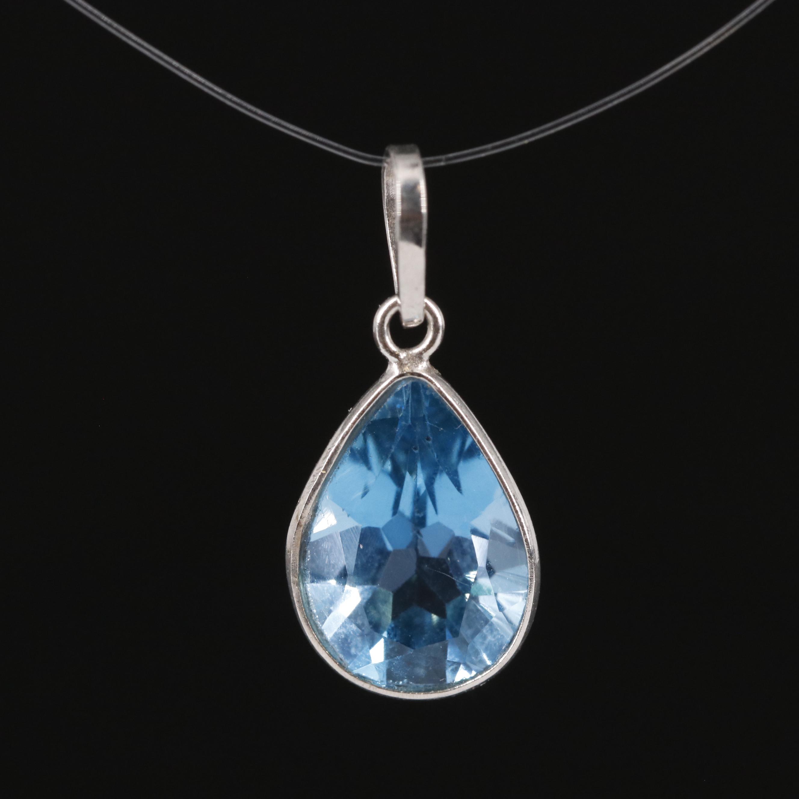 14K Swiss Blue Topaz Pendant