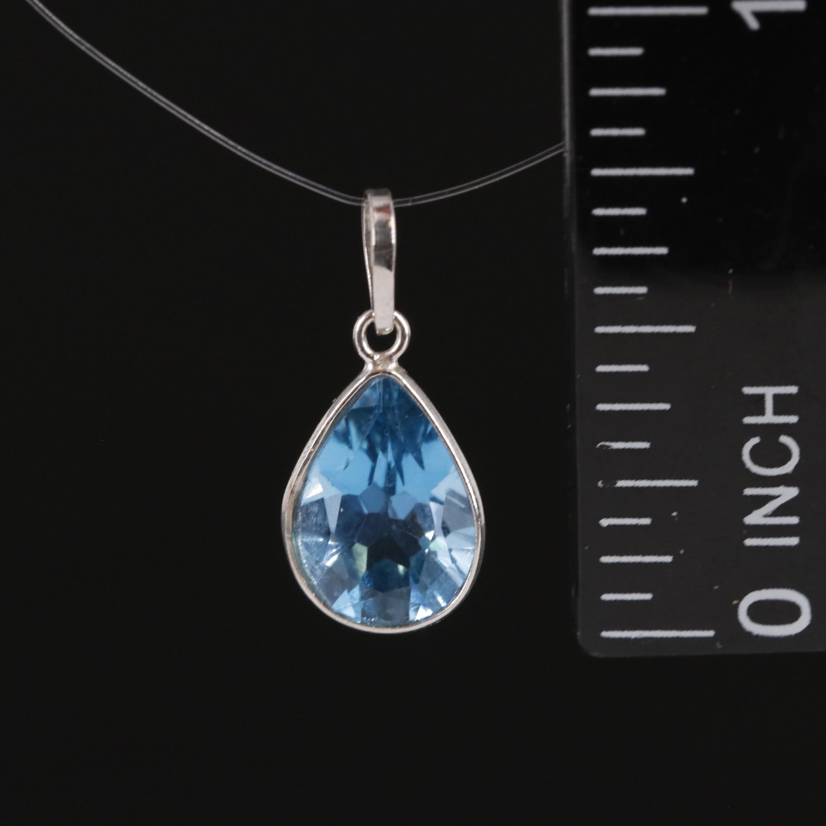 14K Swiss Blue Topaz Pendant