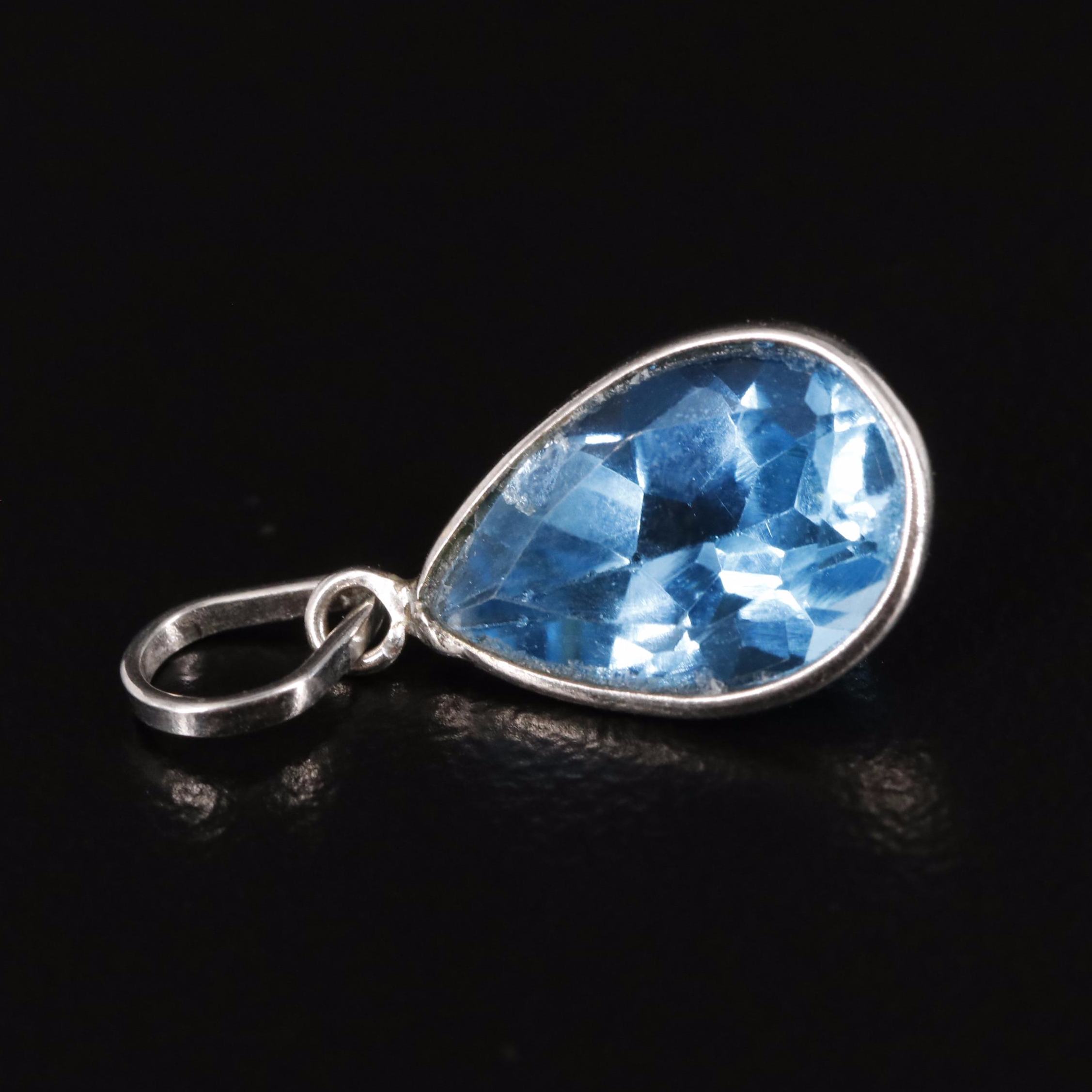 14K Swiss Blue Topaz Pendant