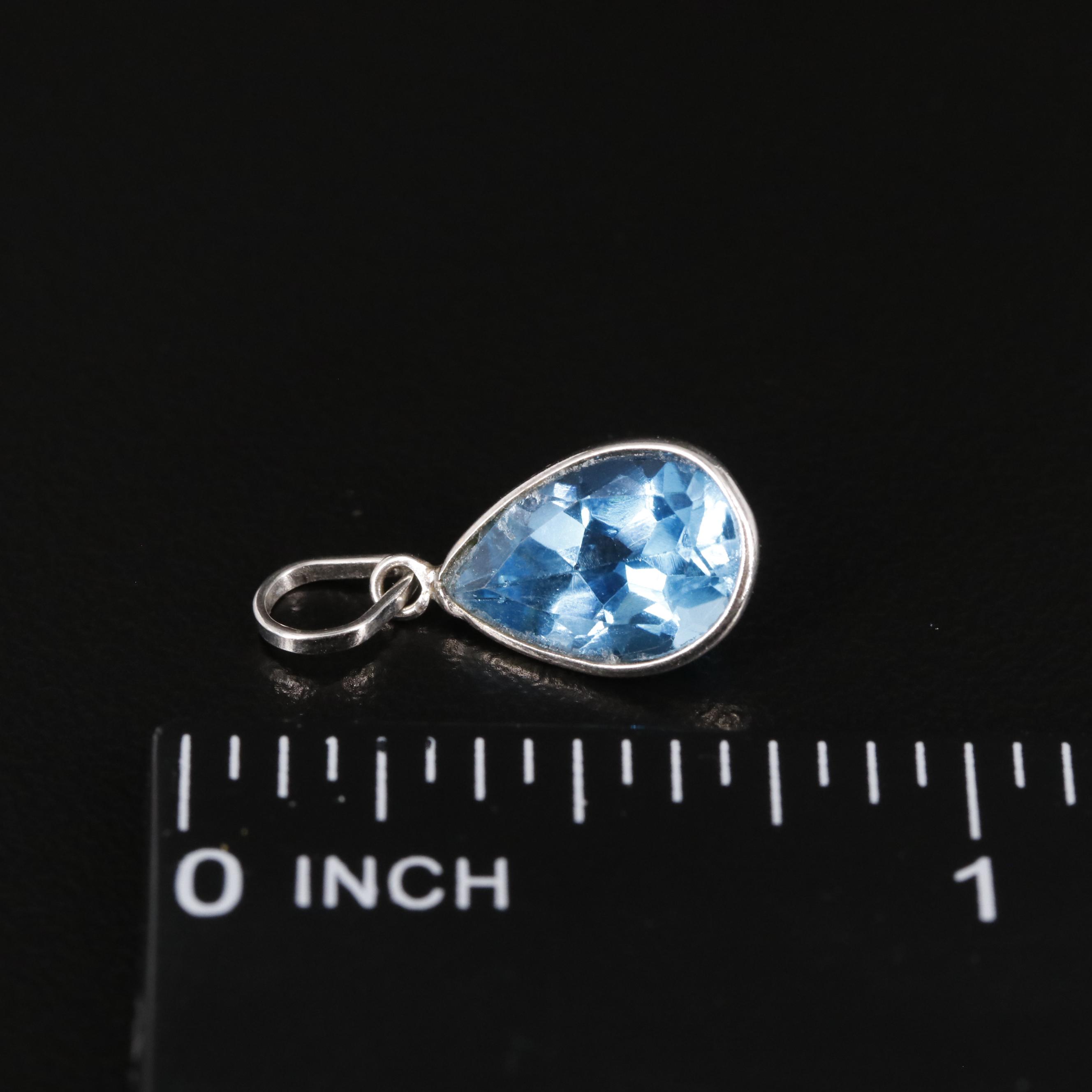 14K Swiss Blue Topaz Pendant