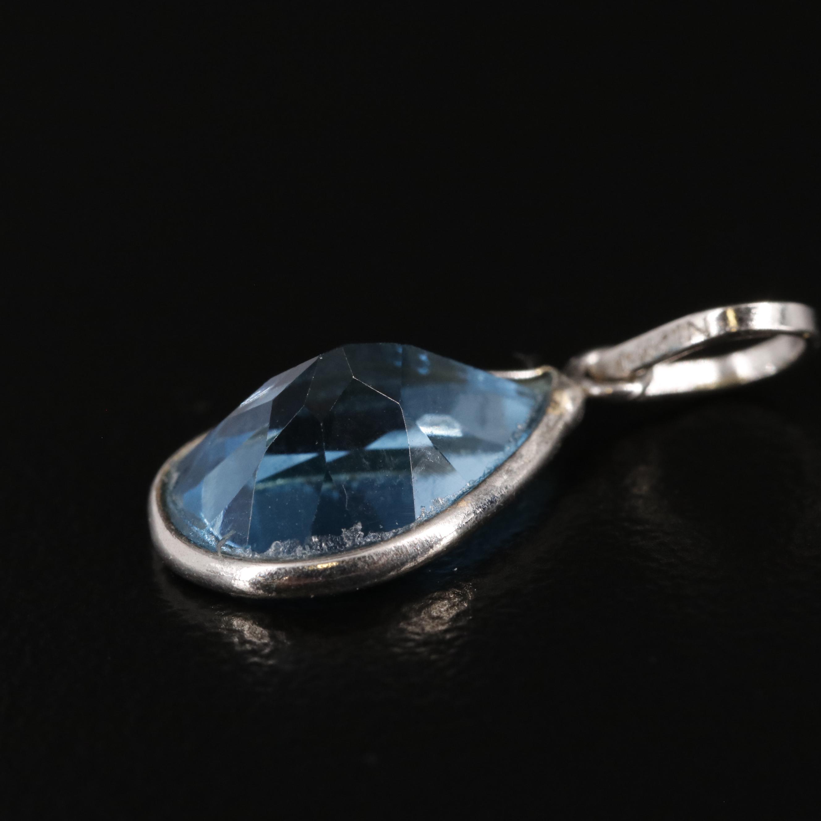 14K Swiss Blue Topaz Pendant