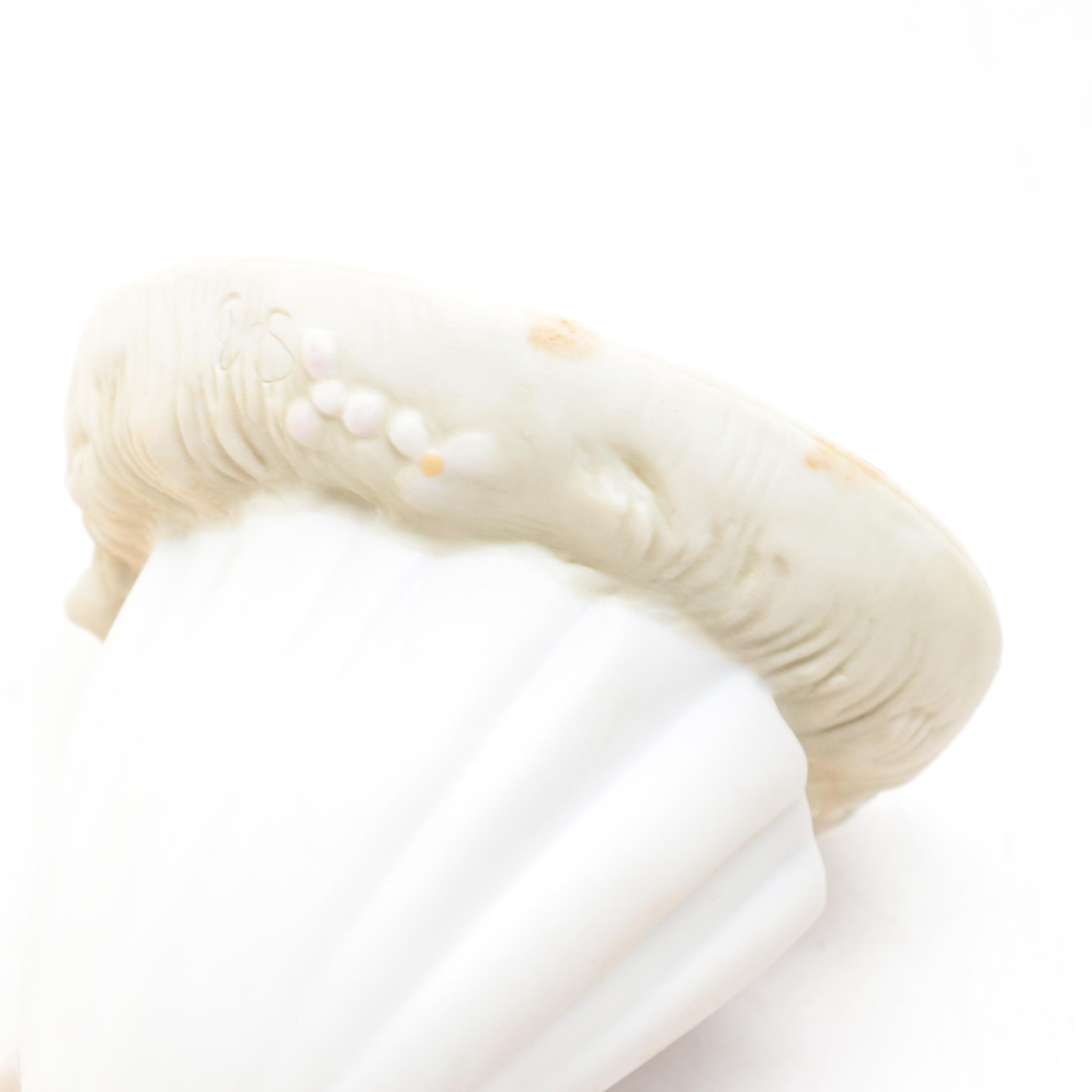 Precious Moment Porcelain Figurines Including "Peace on Earth," and More