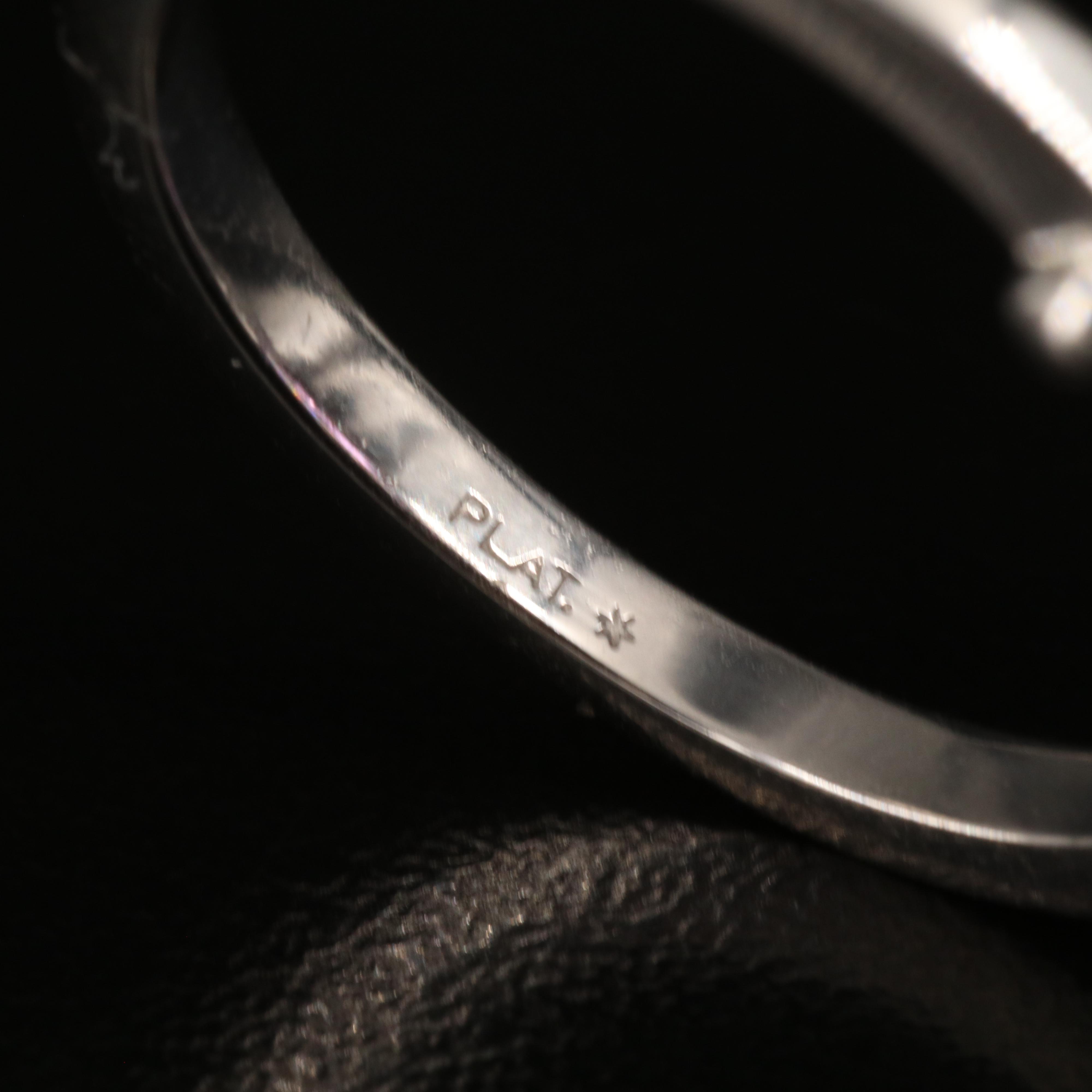 Platinum 10.73 CT Amethyst and 1.23 CTW Diamond Halo Ring