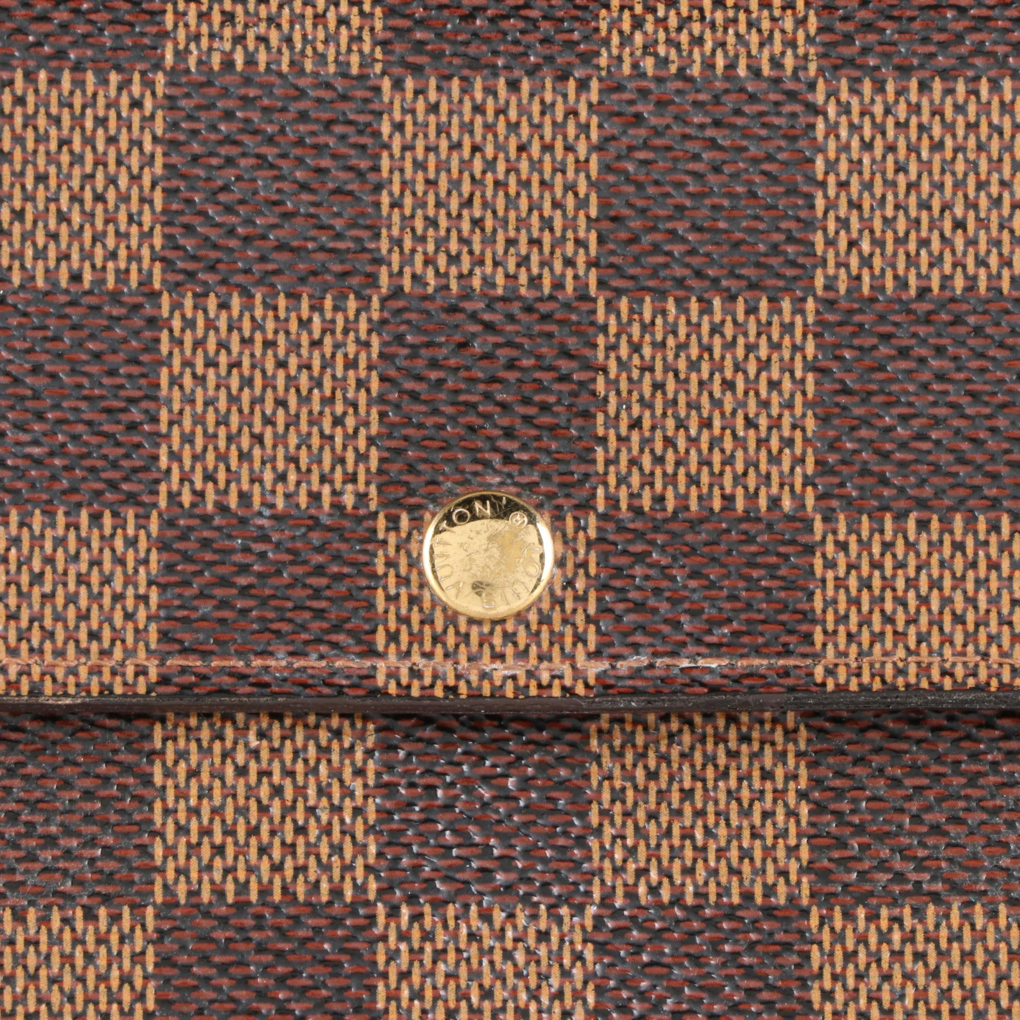 Louis Vuitton Sarah Wallet in Damier Ebene Canvas and Leather