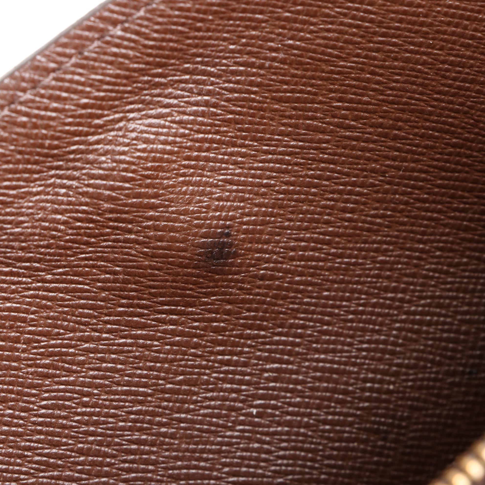 Louis Vuitton Sarah Wallet in Damier Ebene Canvas and Leather