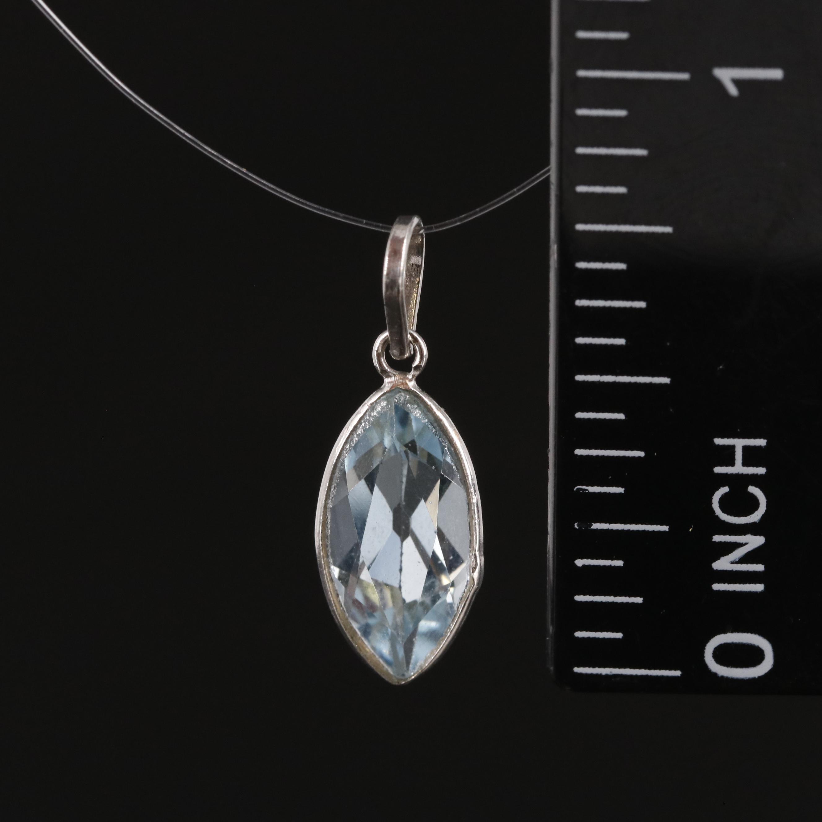 14K Blue Topaz Pendant