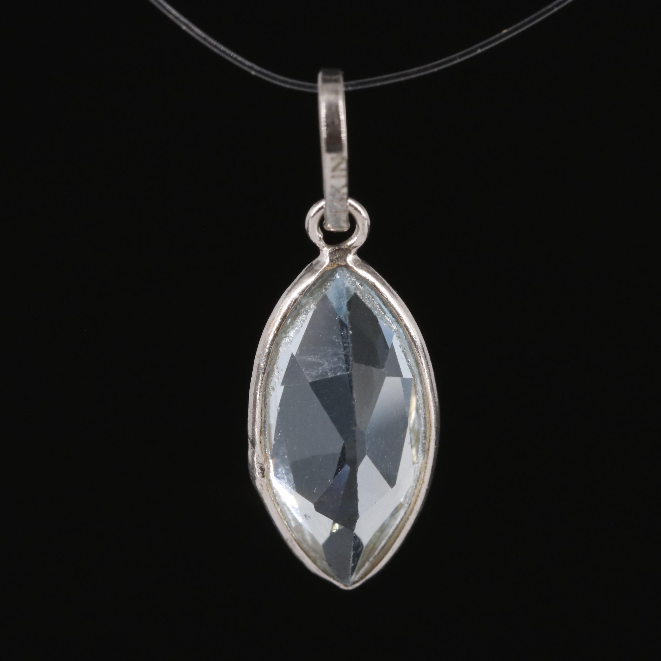 14K Blue Topaz Pendant