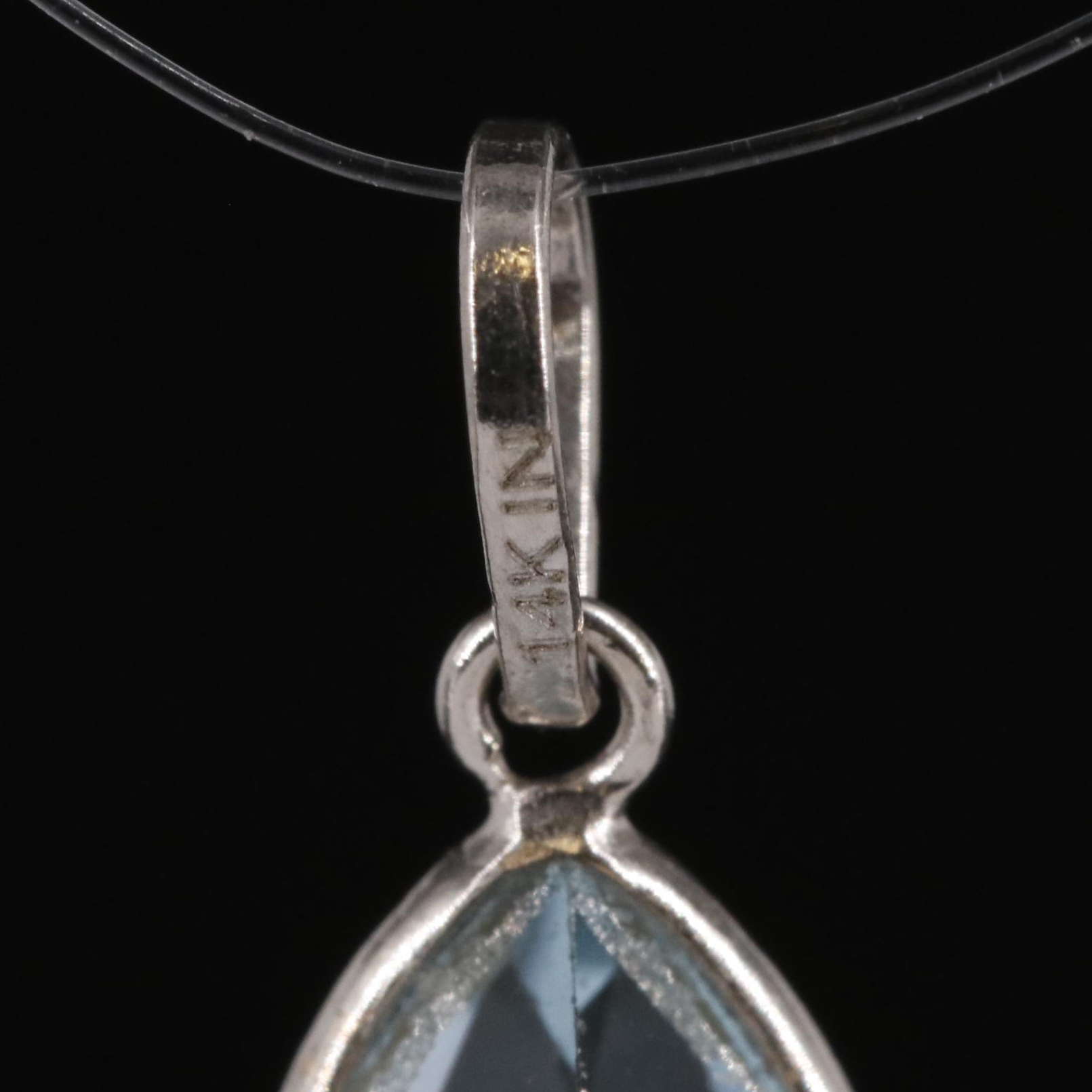 14K Blue Topaz Pendant