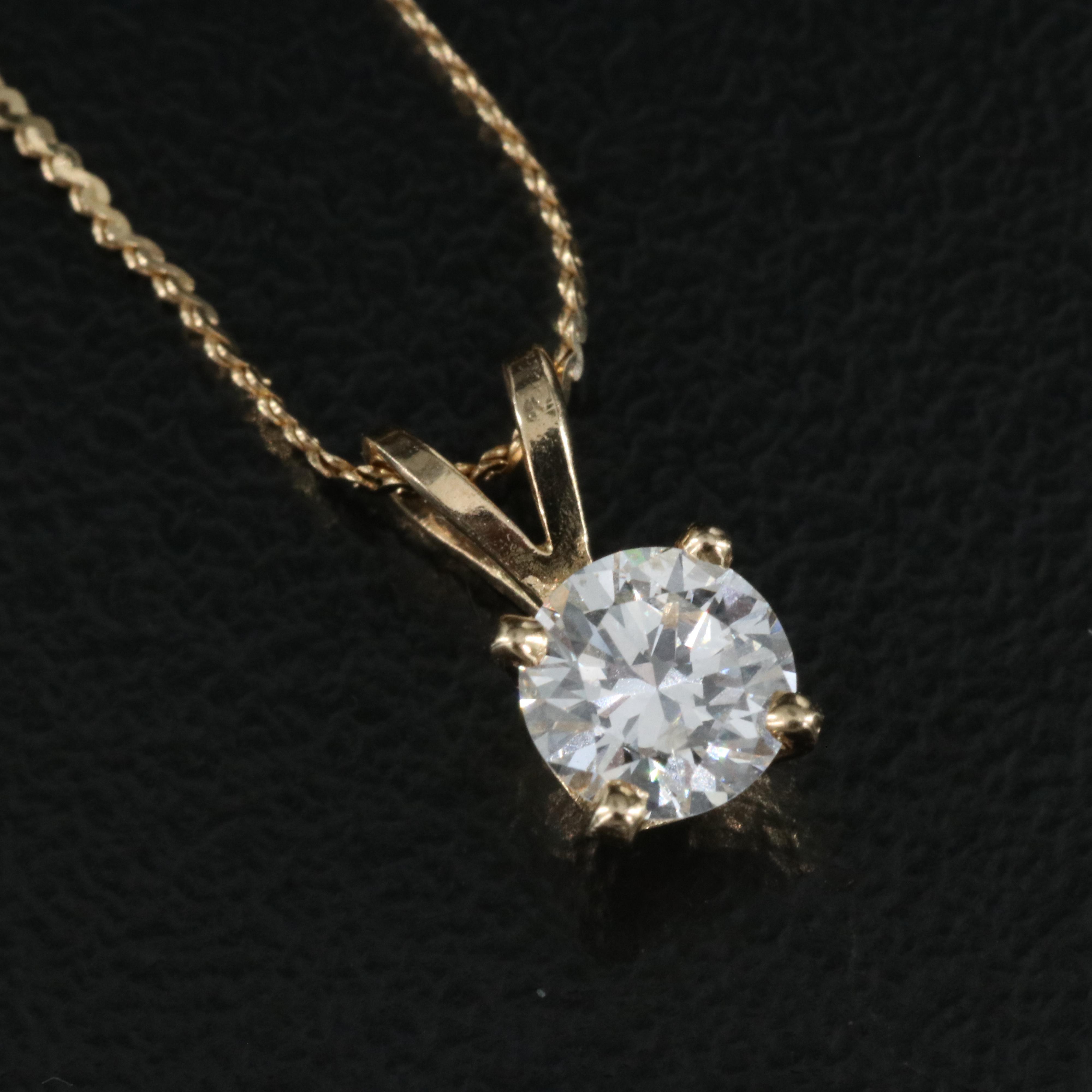 14K 0.37 CT Diamond Necklace and 0.46 CTW Diamond Stud Earrings