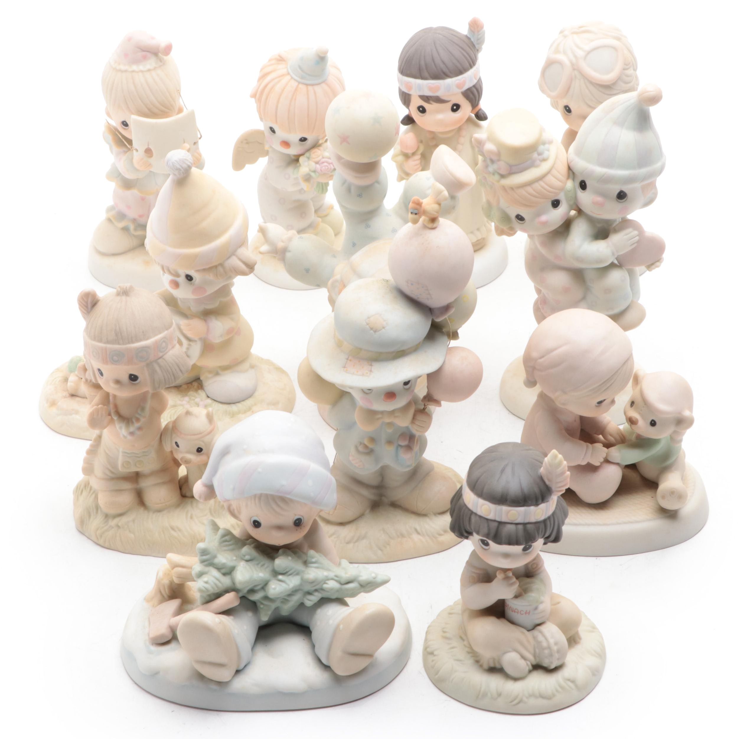 Precious Moments Porcelain Figurines Including "Put on a Happy Face" and More
