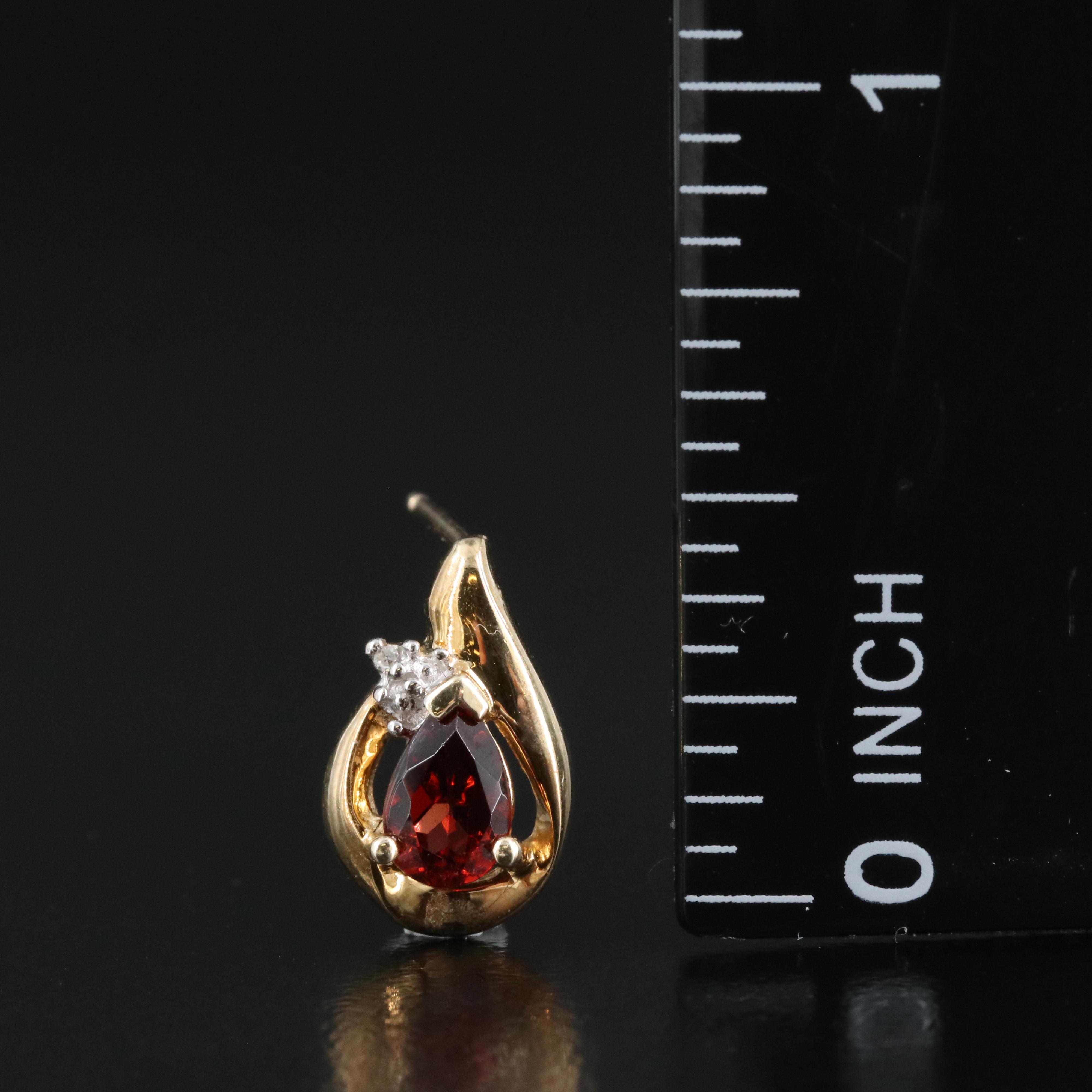 10K Garnet and 0.01 CTW Diamond Earrings