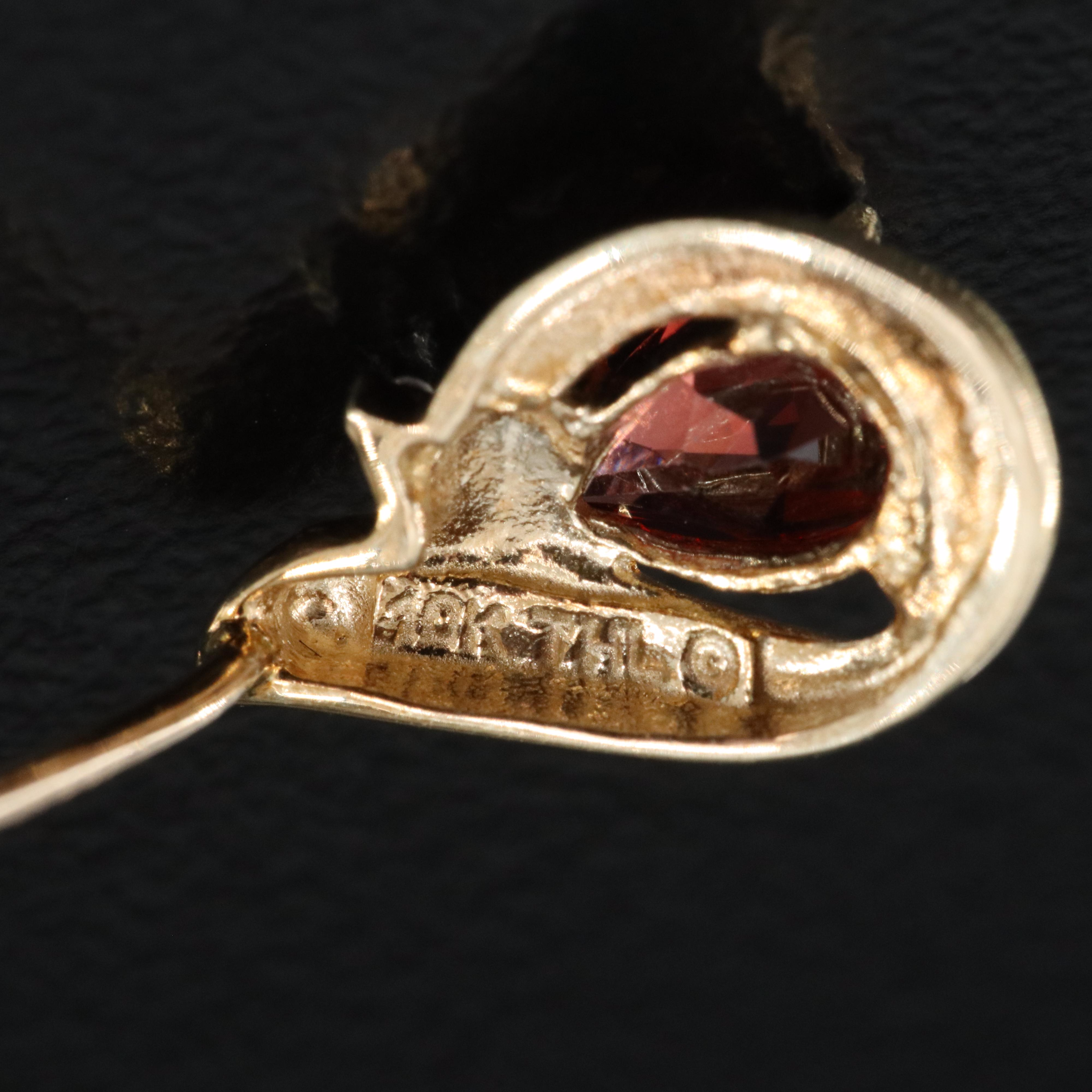 10K Garnet and 0.01 CTW Diamond Earrings