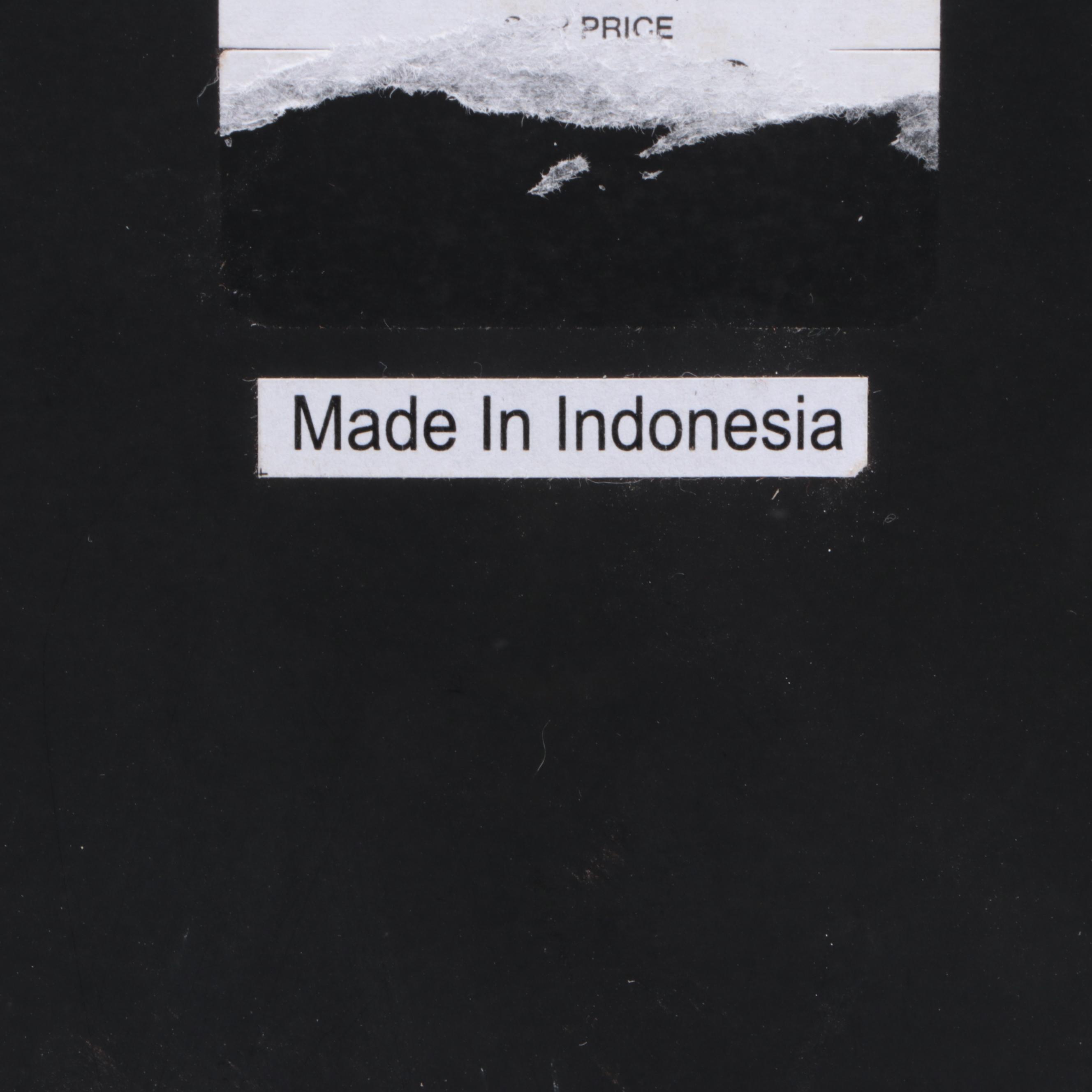 Round Stone Sculpture on Metal Base