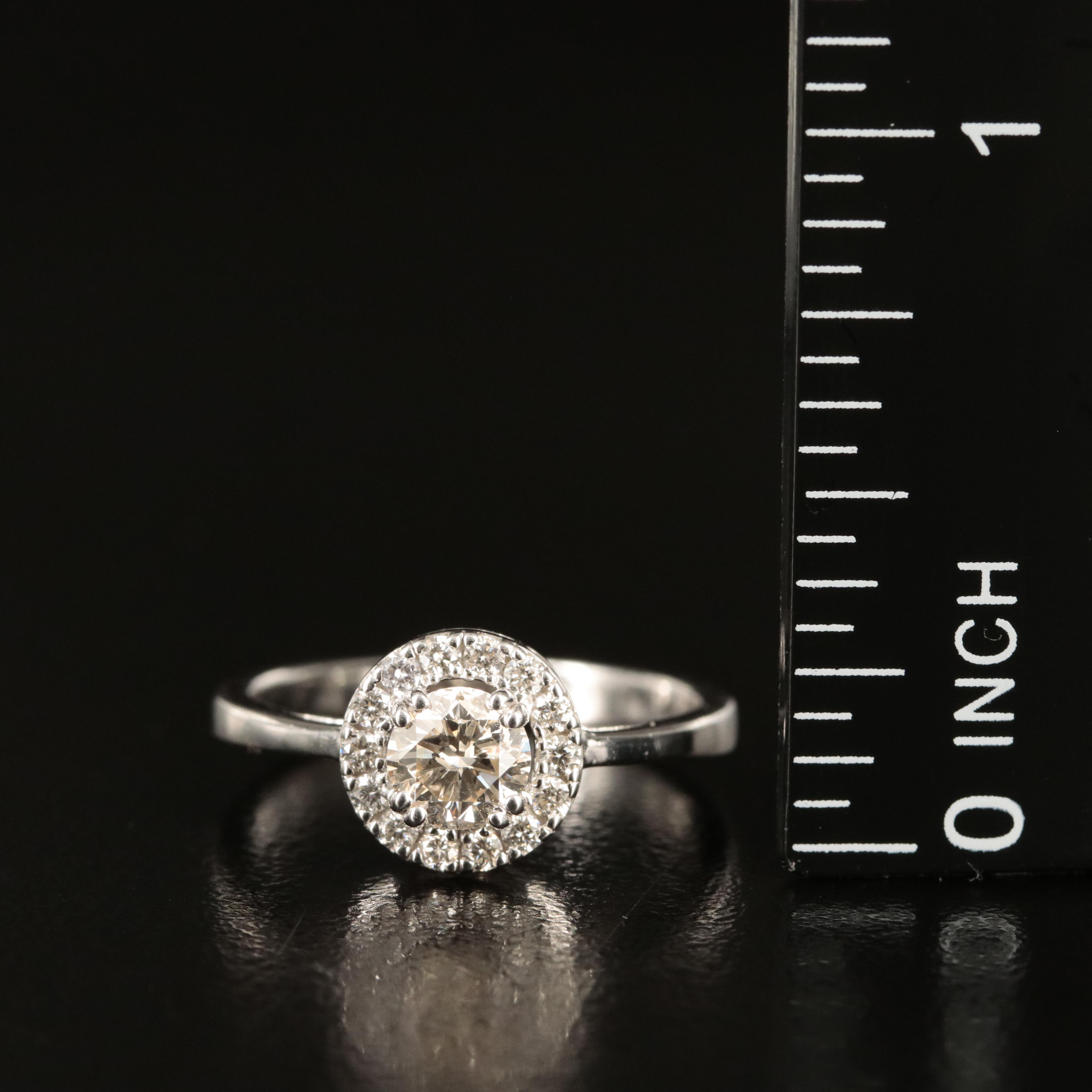 14K 0.61 CTW Diamond Ring