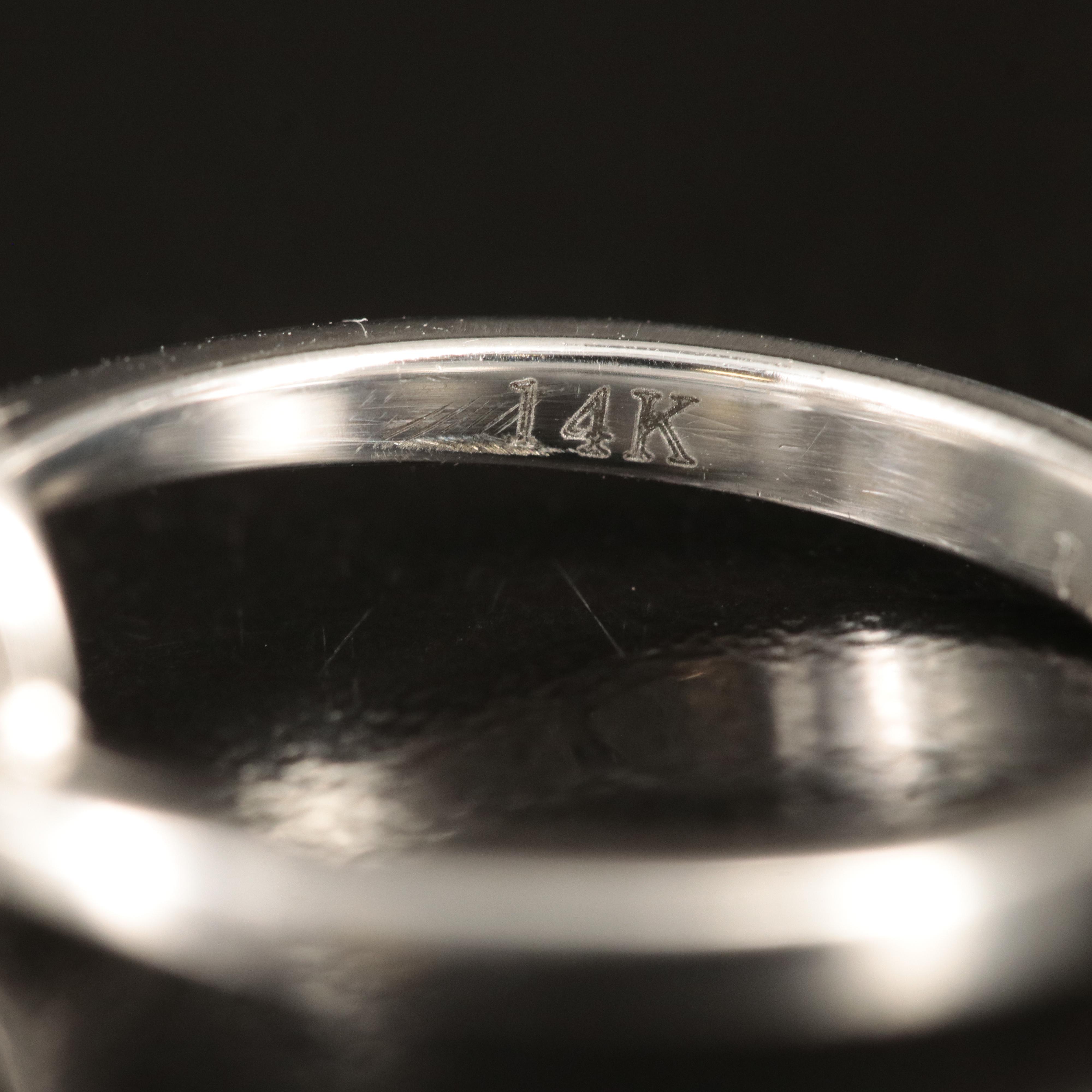 14K 0.61 CTW Diamond Ring