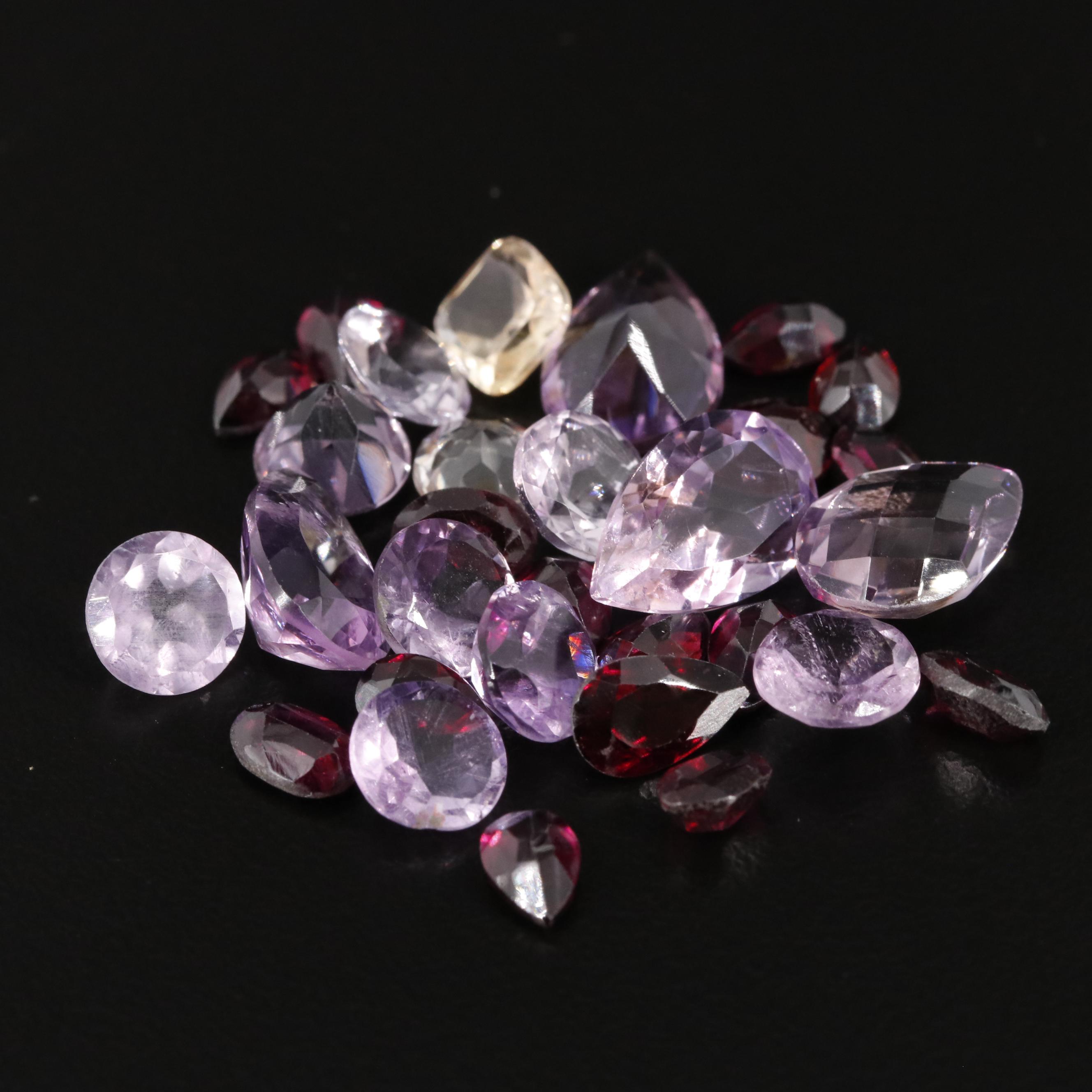 Loose 32.95 CTW Amethyst Citrine and Garnet Lot