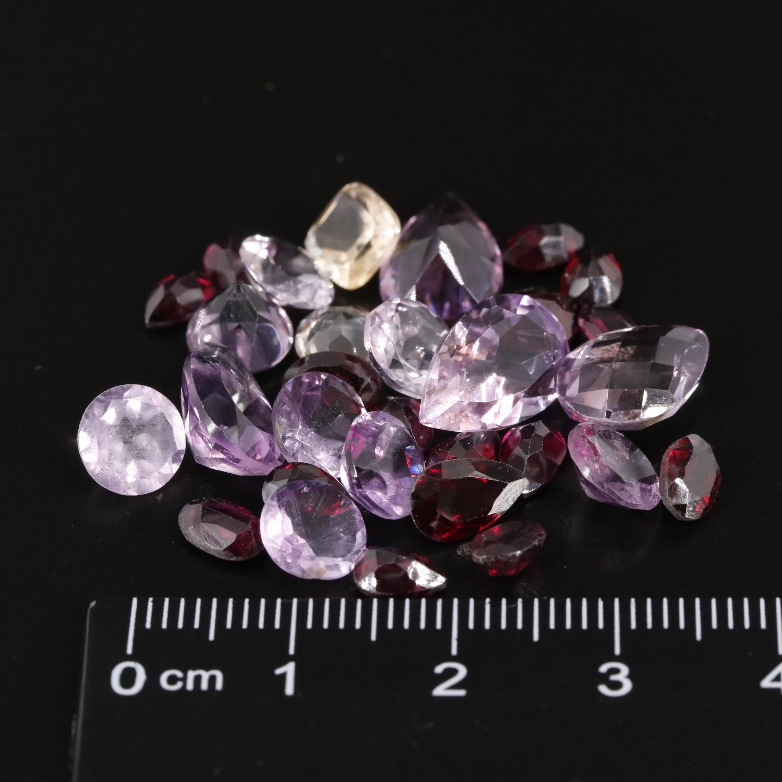 Loose 32.95 CTW Amethyst Citrine and Garnet Lot