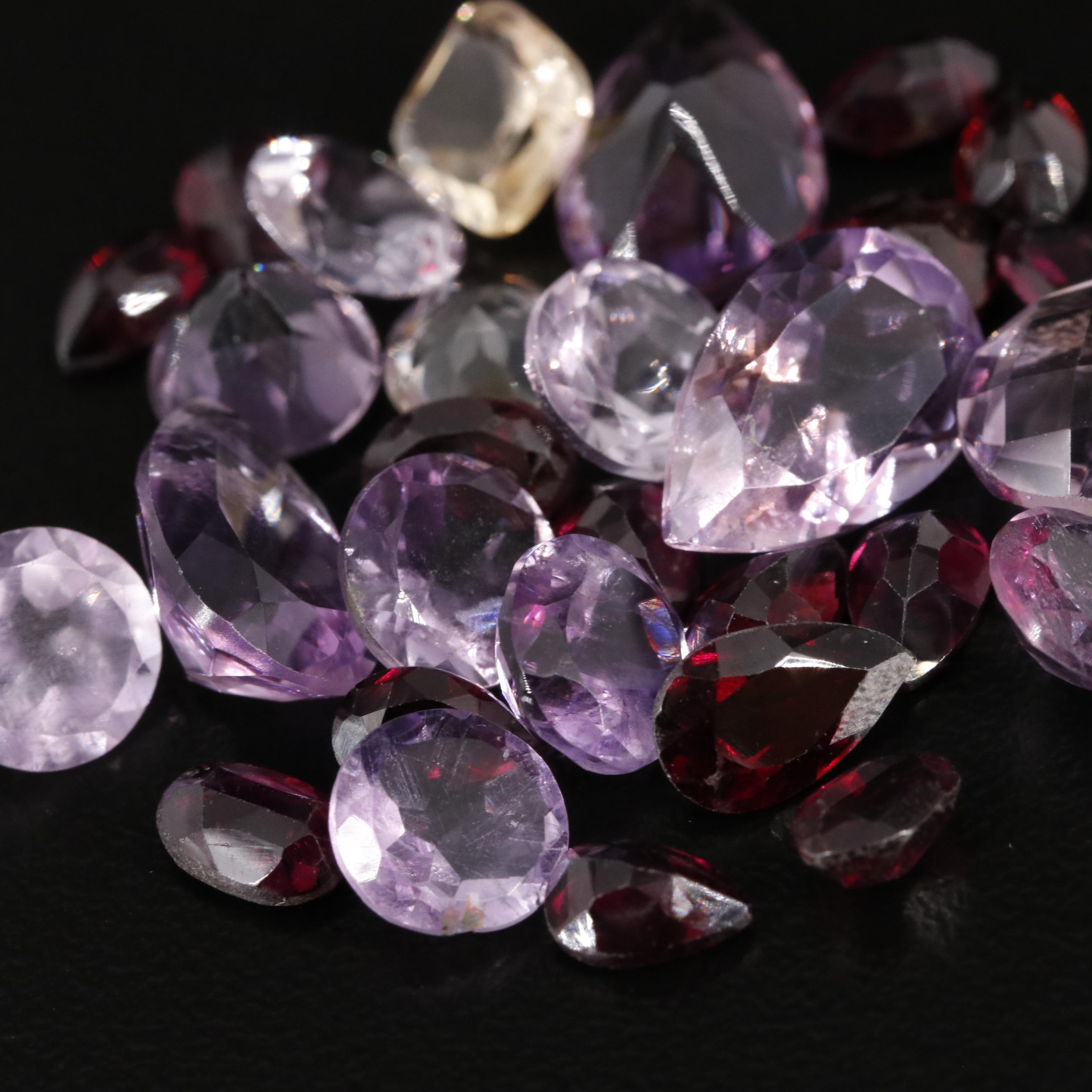 Loose 32.95 CTW Amethyst Citrine and Garnet Lot