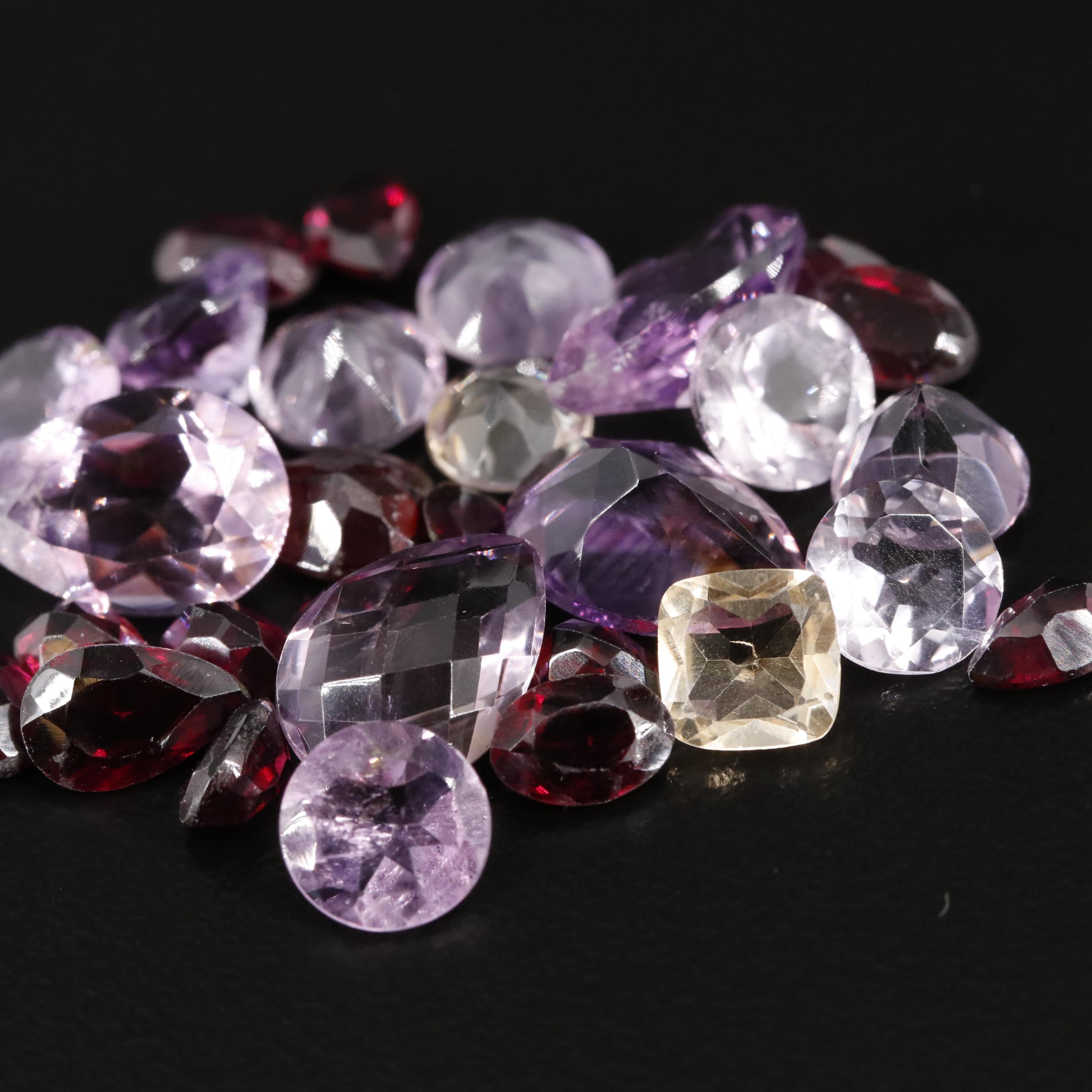 Loose 32.95 CTW Amethyst Citrine and Garnet Lot