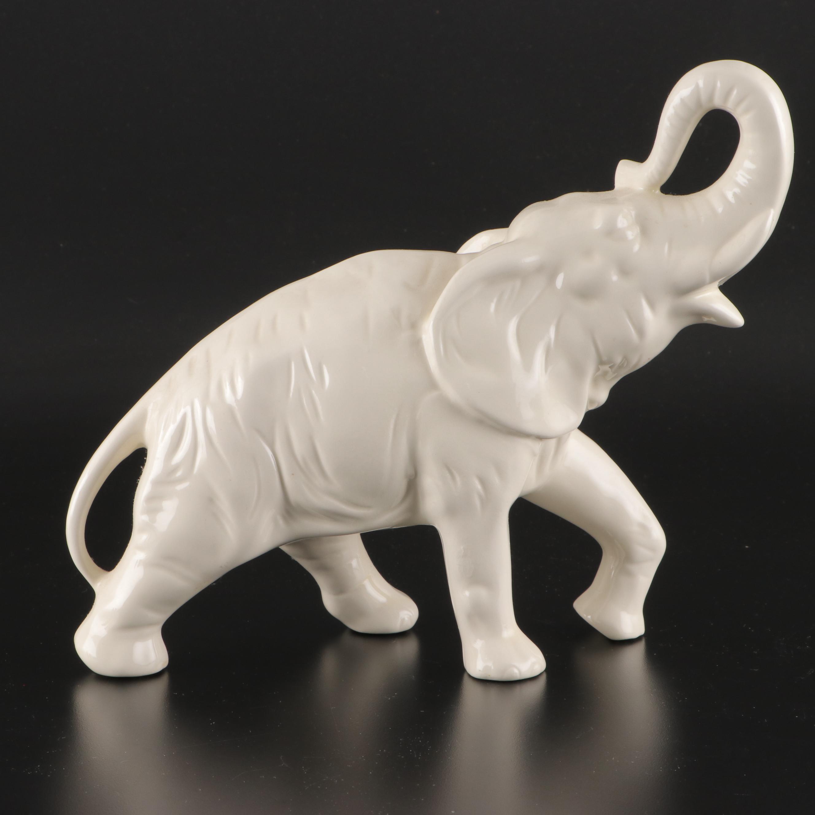 Homco with Other Ceramic Elephant Figurines