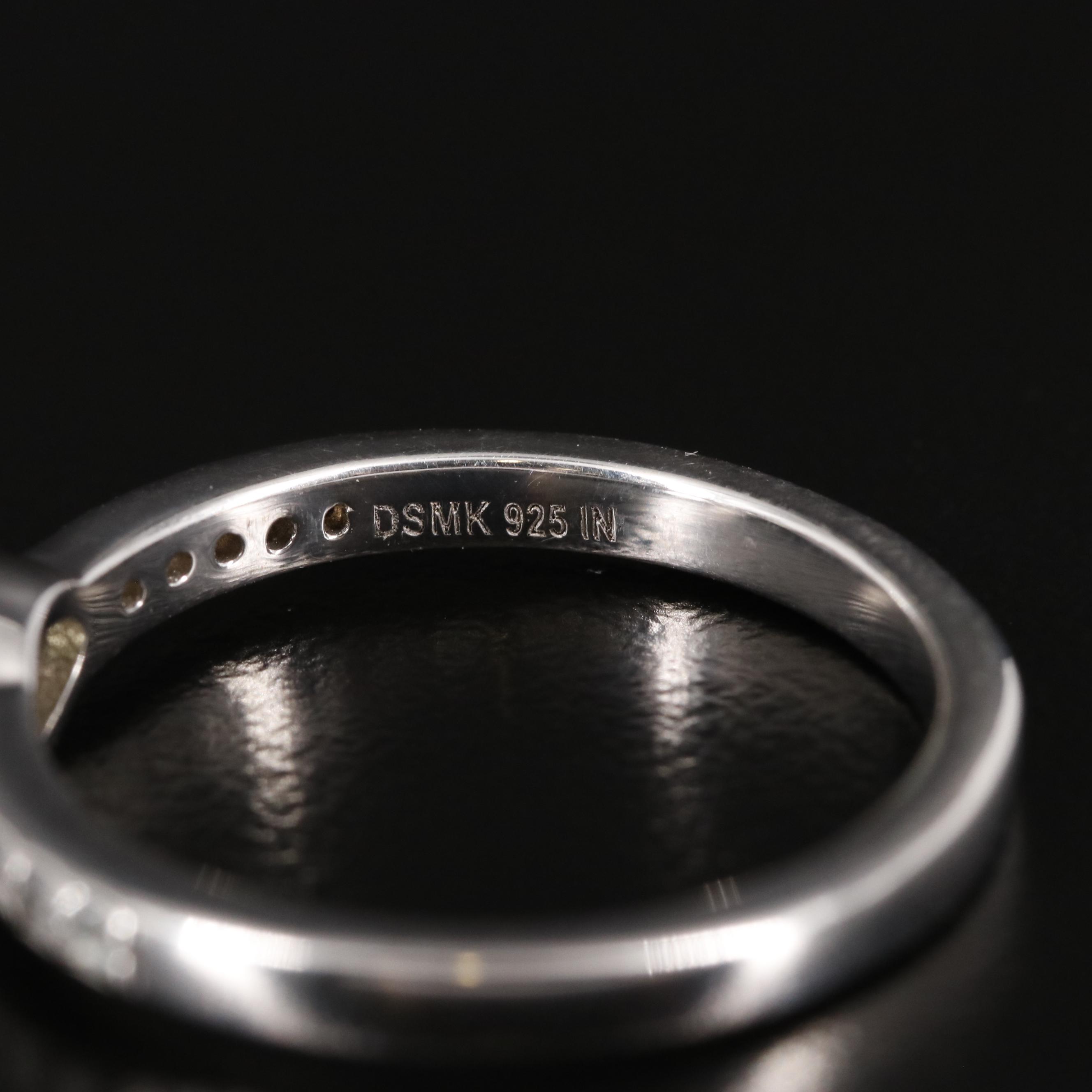 Sterling Peridot and White Topaz Ring