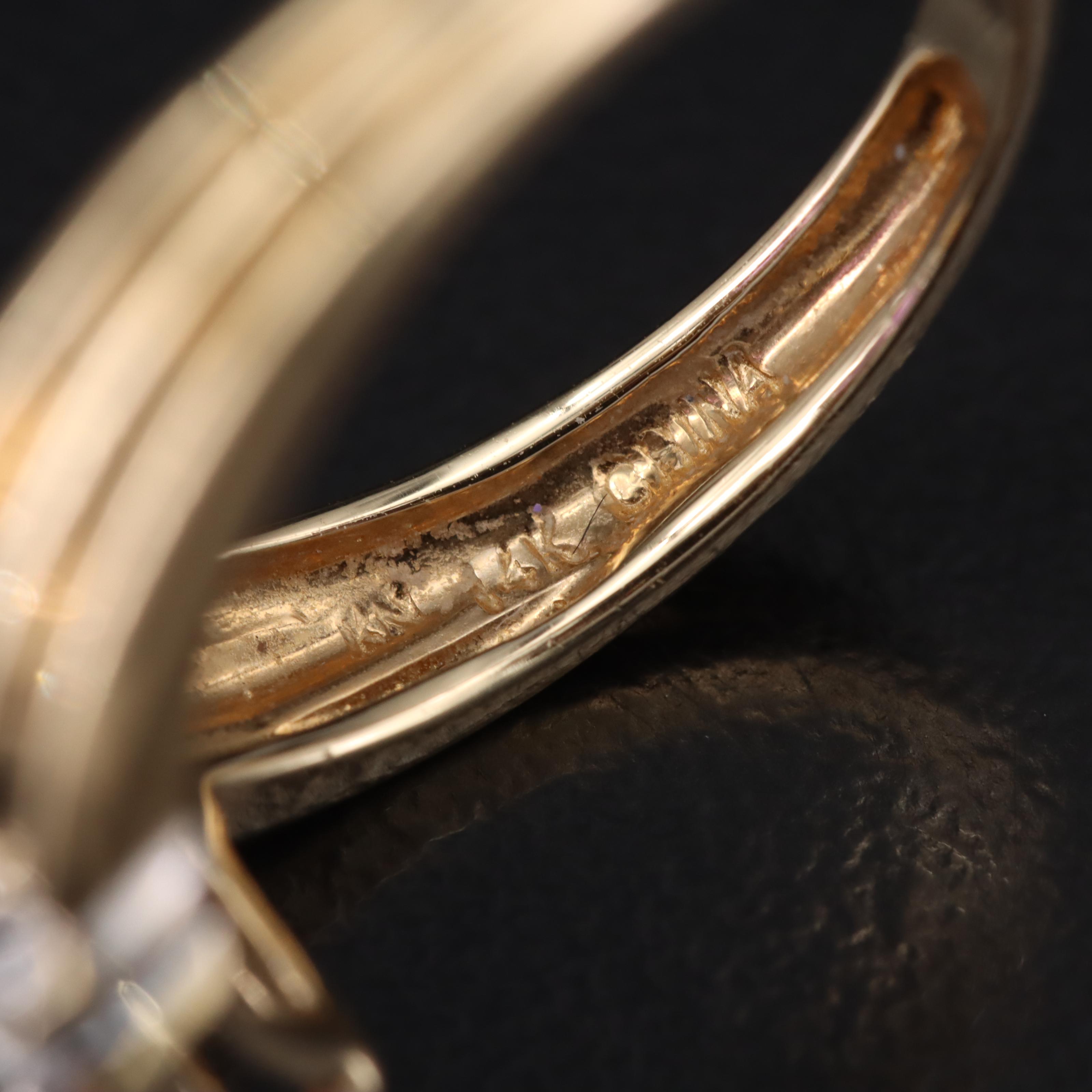 14K Amethyst, Sky Blue Topaz and Diamond Bypass Ring