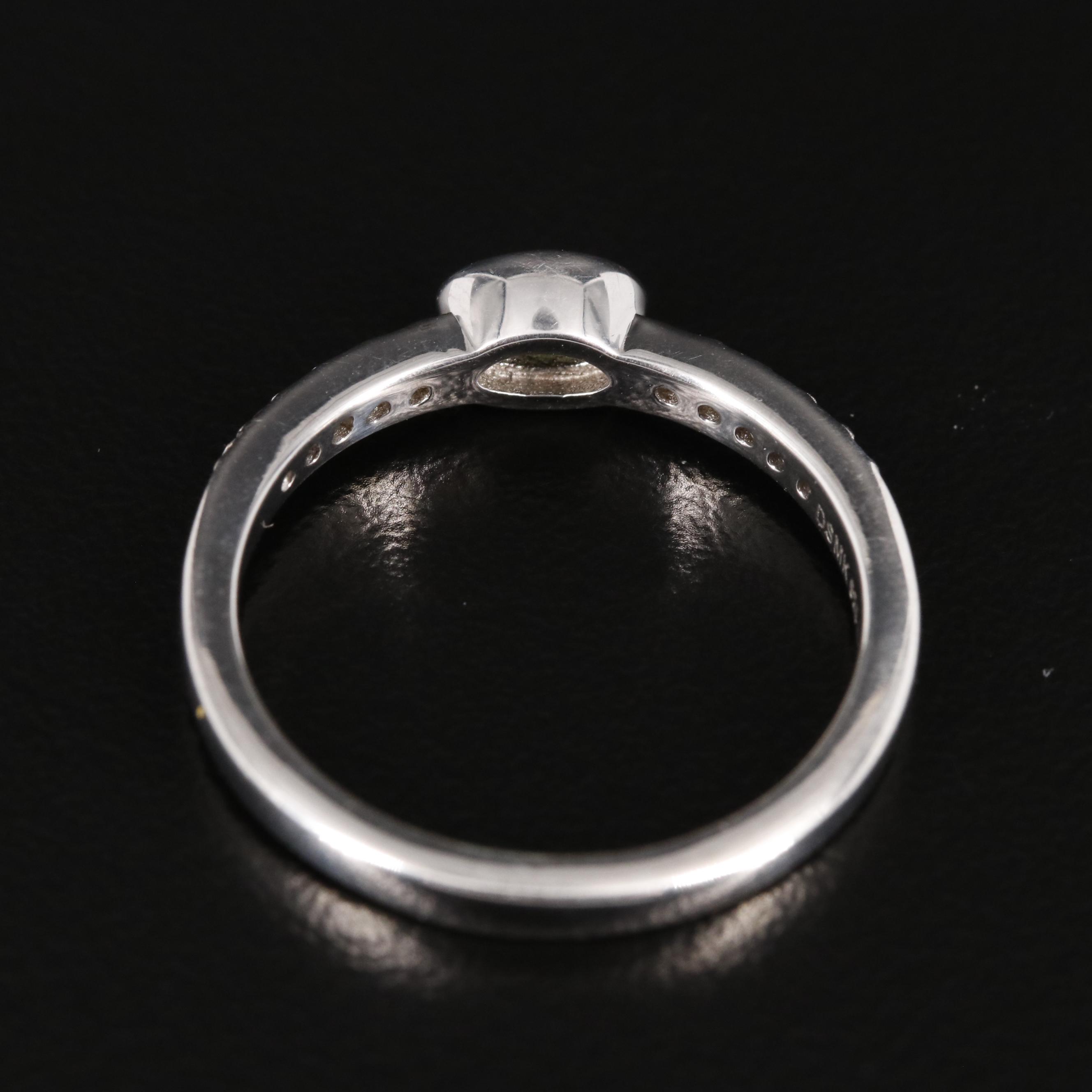 Sterling Peridot and White Topaz Ring