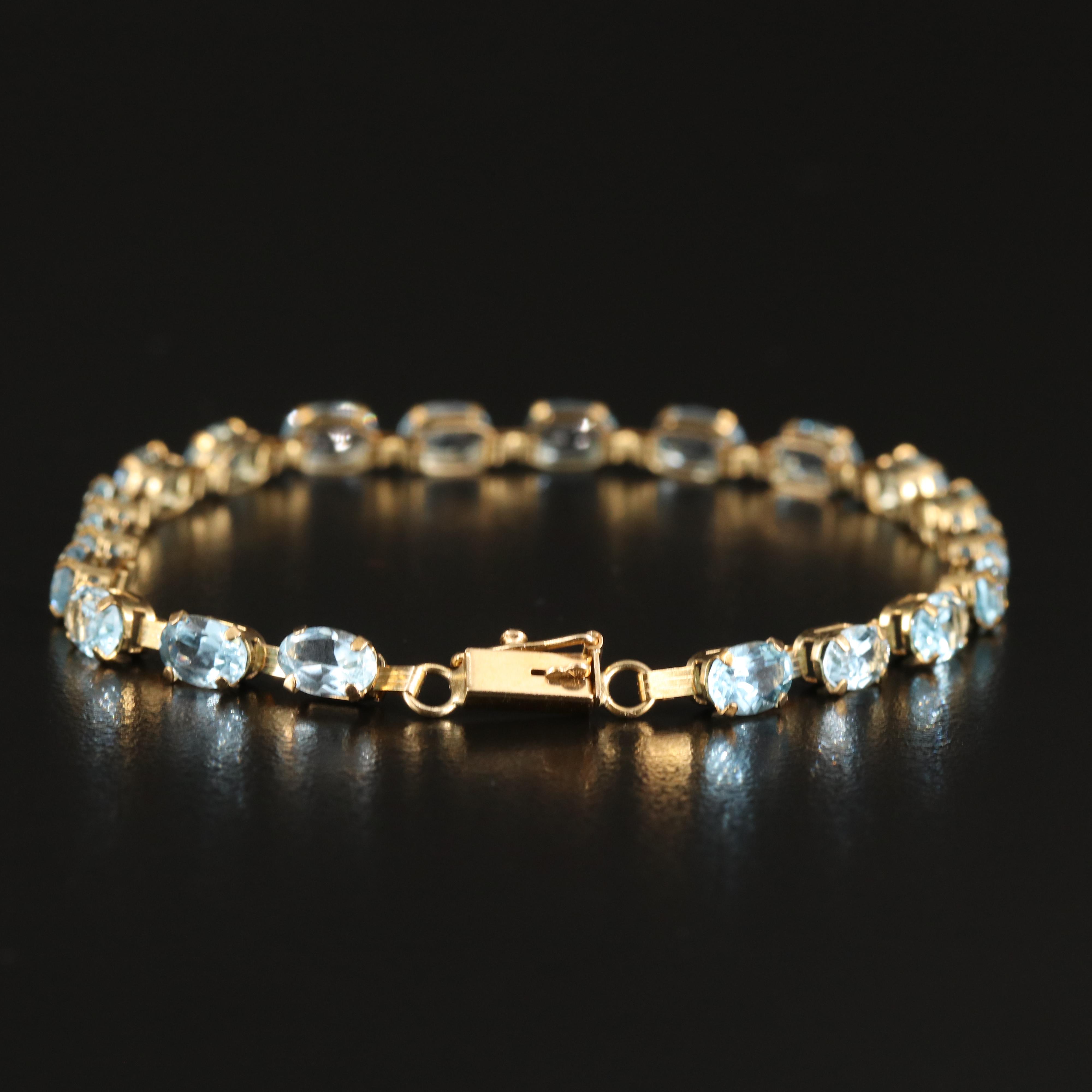 10K Swiss Blue Topaz Line Bracelet