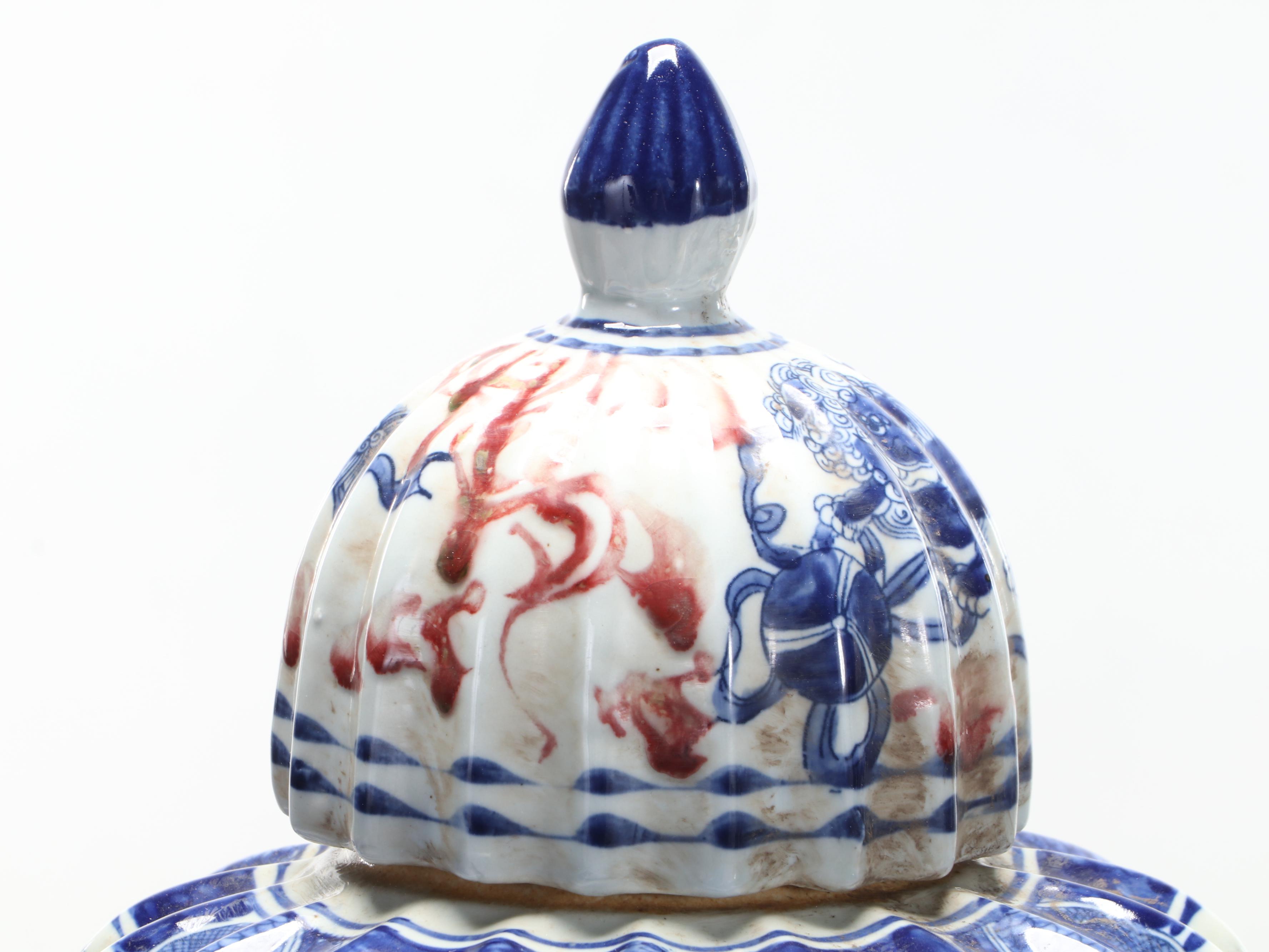 Pair of Chinese Kangxi Style Blue and White Porcelain Guardian Lion Ribbed Jars